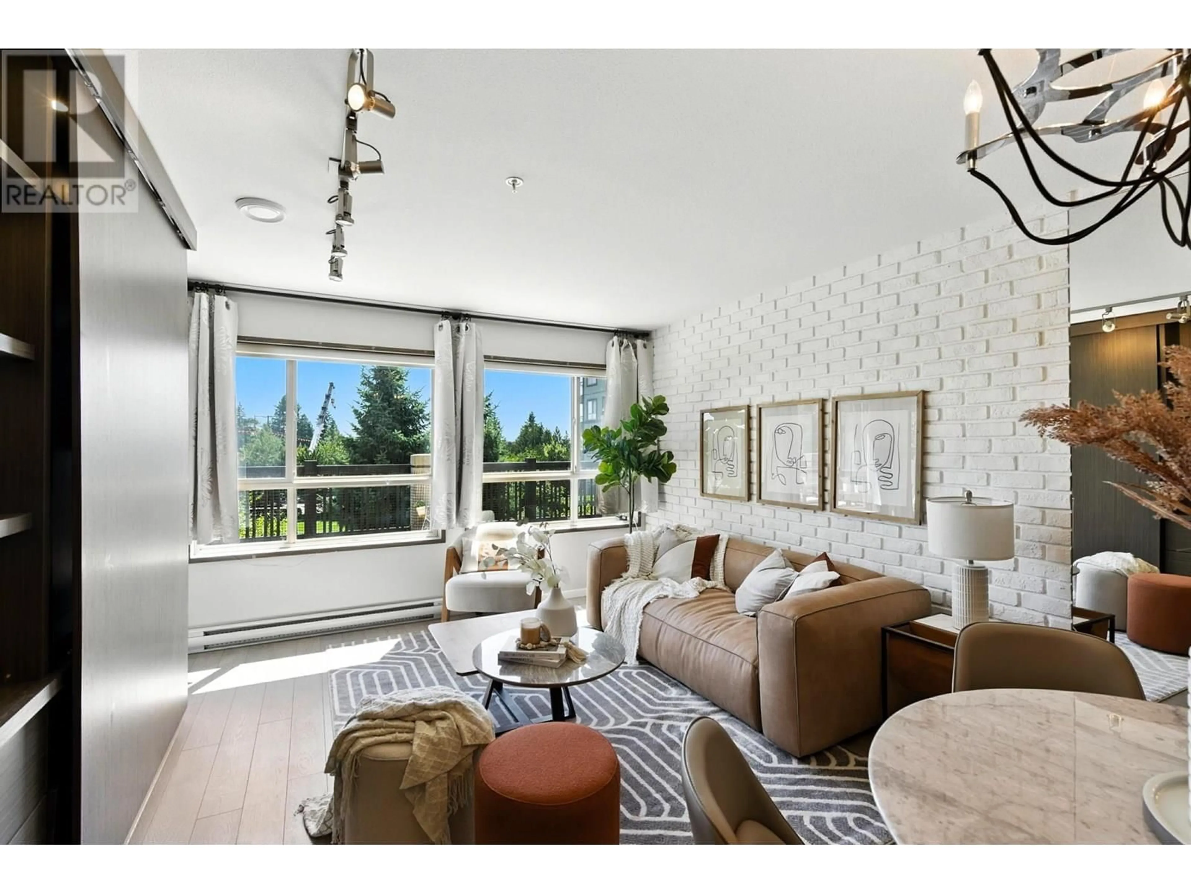 Living room with furniture, unknown for 205 - 3156 DAYANEE SPRINGS BOULEVARD, Coquitlam British Columbia V3E0B7