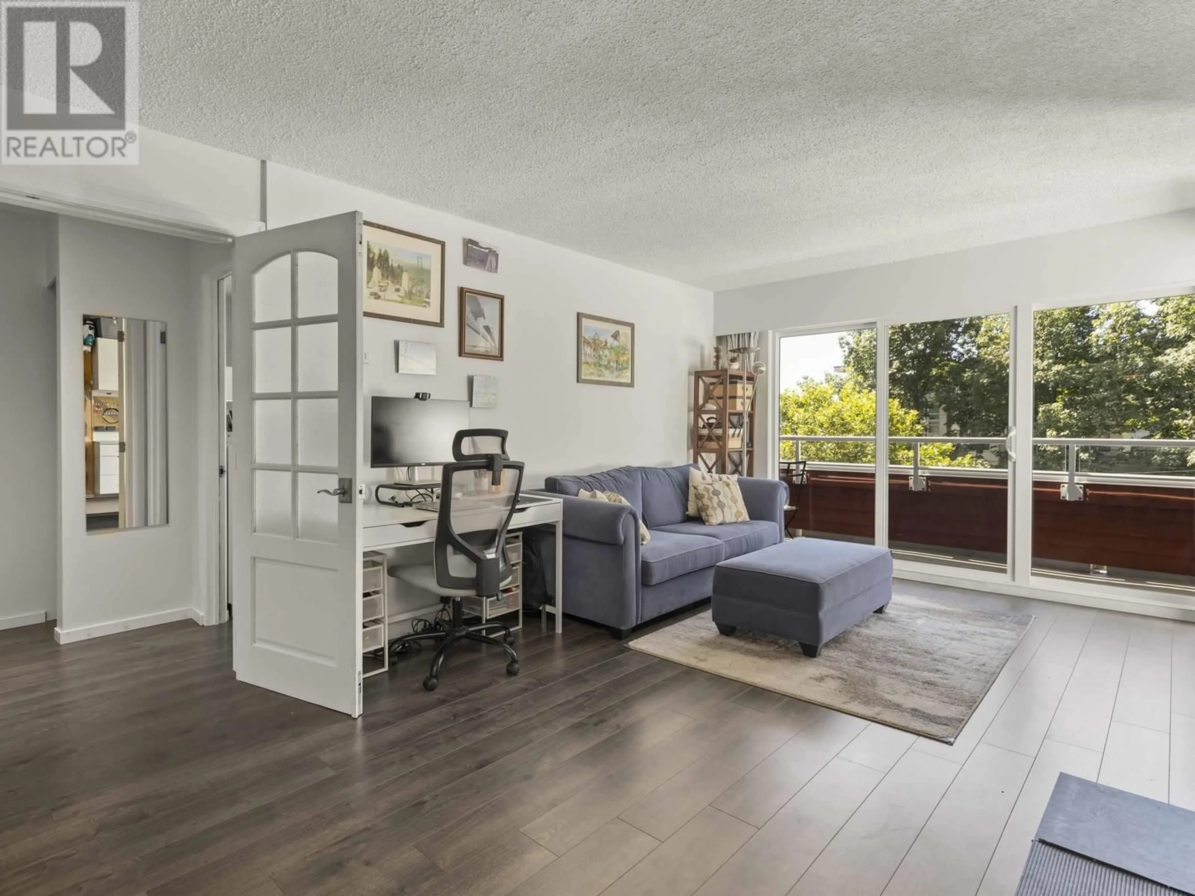 Living room with furniture, wood/laminate floor for 401 - 250 1 STREET, North Vancouver British Columbia V7M1B4