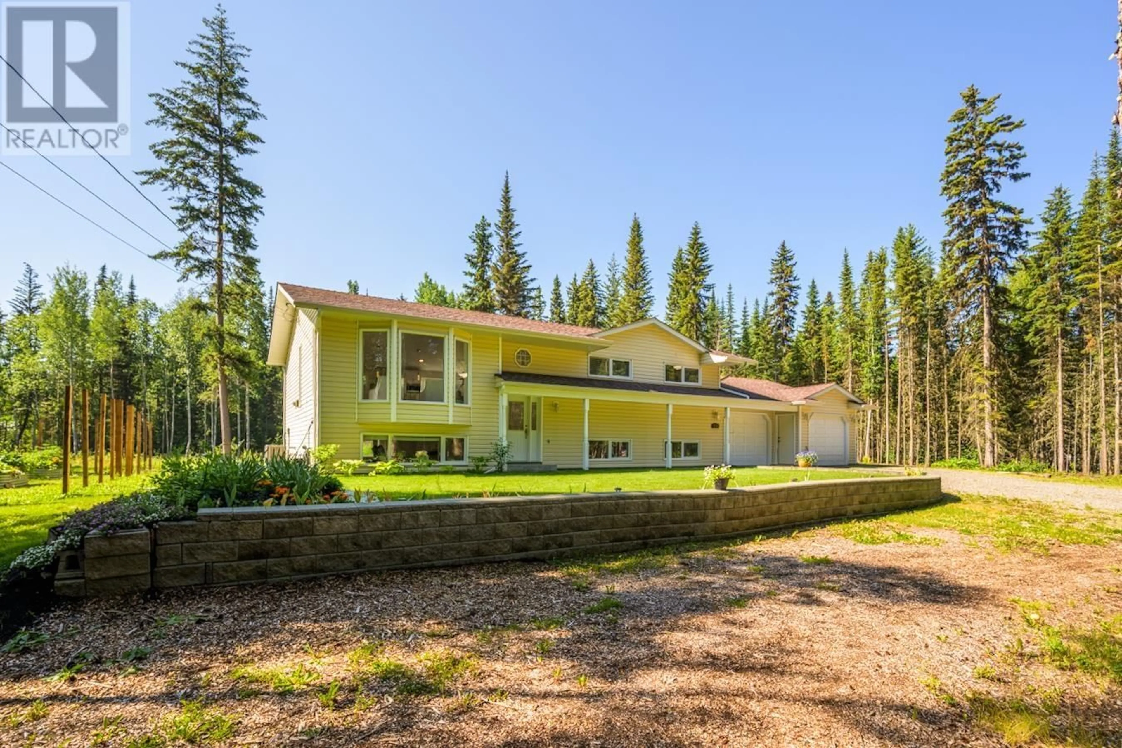 A pic from outside/outdoor area/front of a property/back of a property/a pic from drone, forest/trees view for 7135 FRENKEL ROAD, Prince George British Columbia V2N6H2
