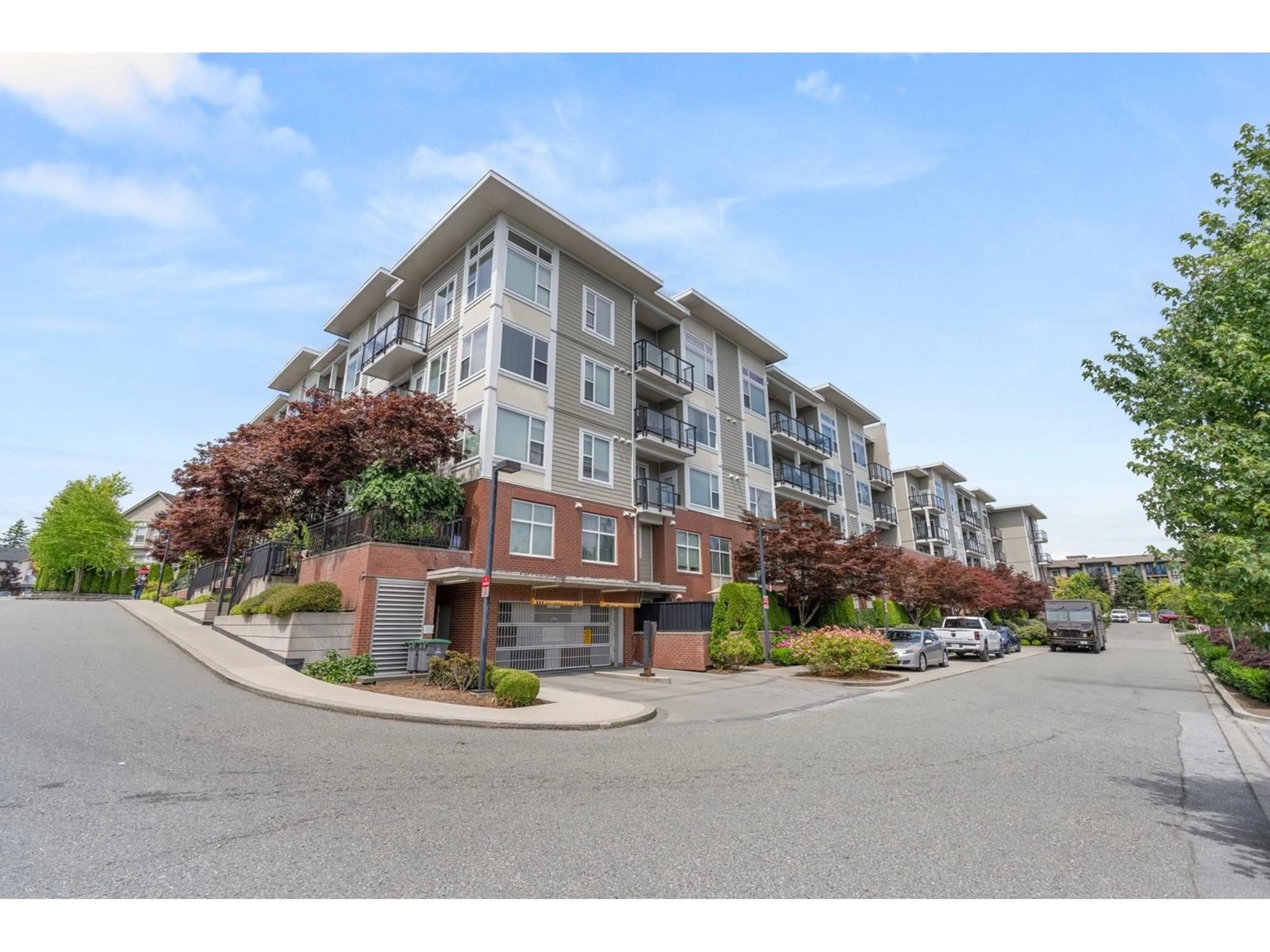 A pic from outside/outdoor area/front of a property/back of a property/a pic from drone, mountain view for 412 - 15956 86A, Surrey British Columbia V4N6N8