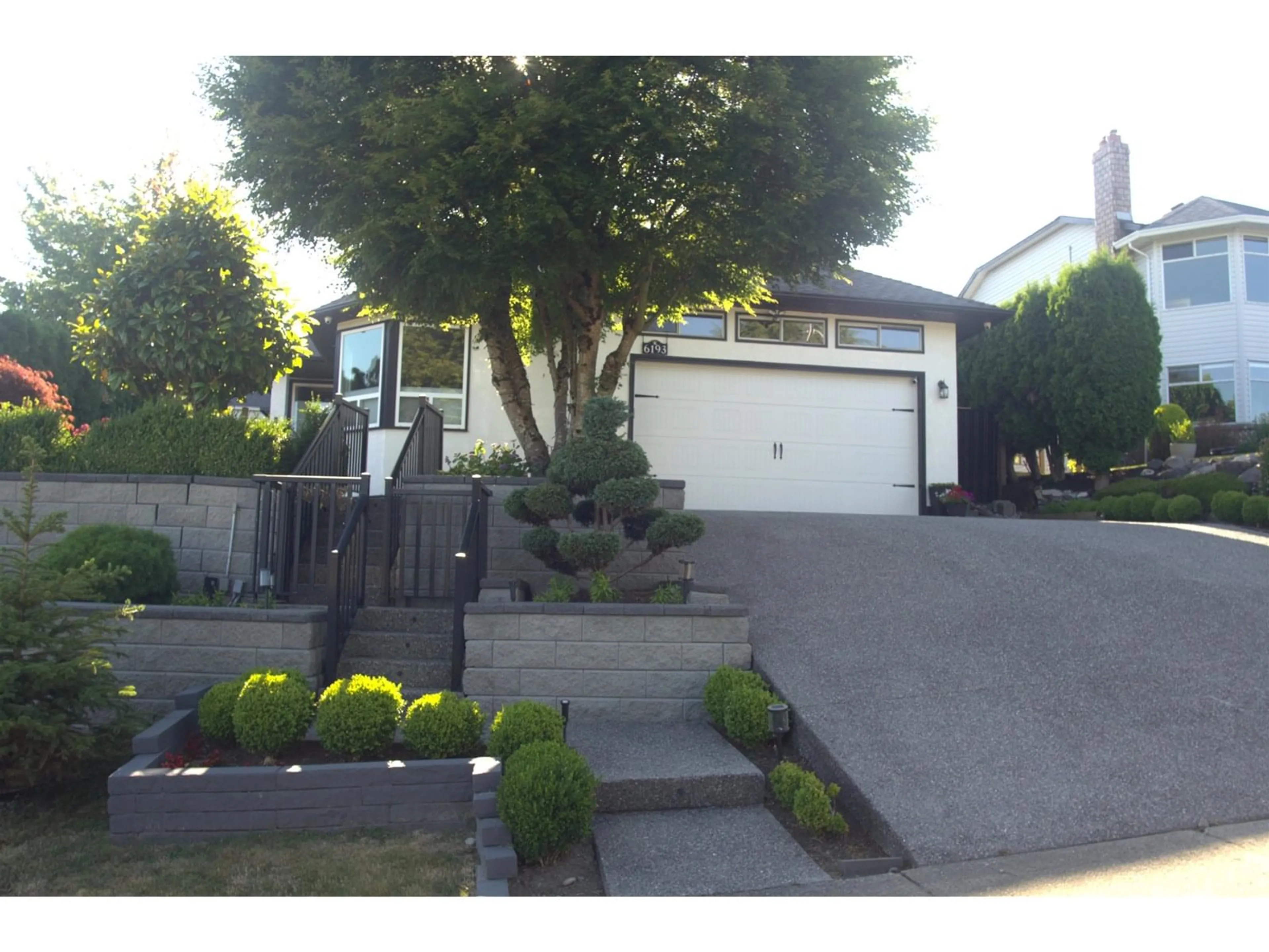 A pic from outside/outdoor area/front of a property/back of a property/a pic from drone, street for 6193 191A, Surrey British Columbia V3S8C7