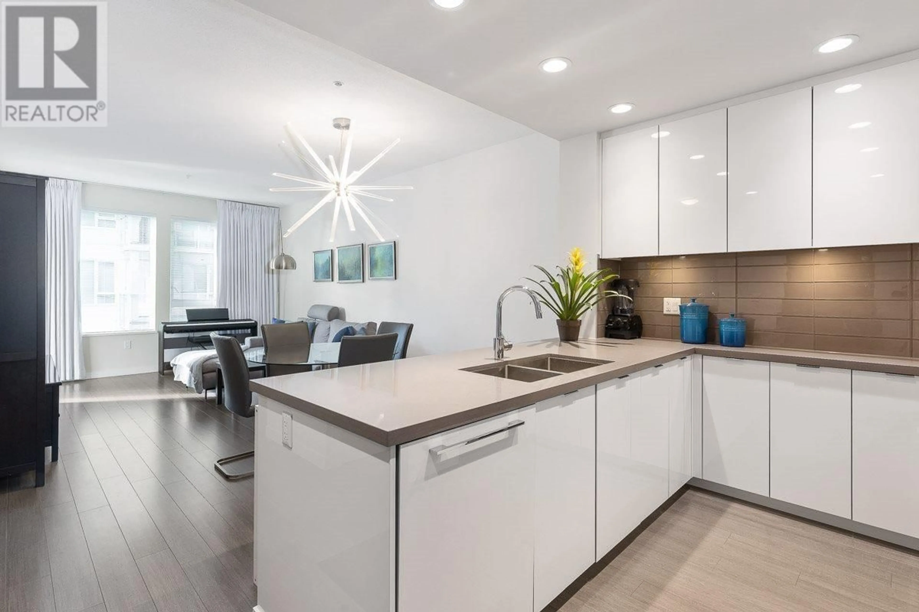 Open concept kitchen, unknown for 413 - 255 1ST STREET, North Vancouver British Columbia V7M3G8