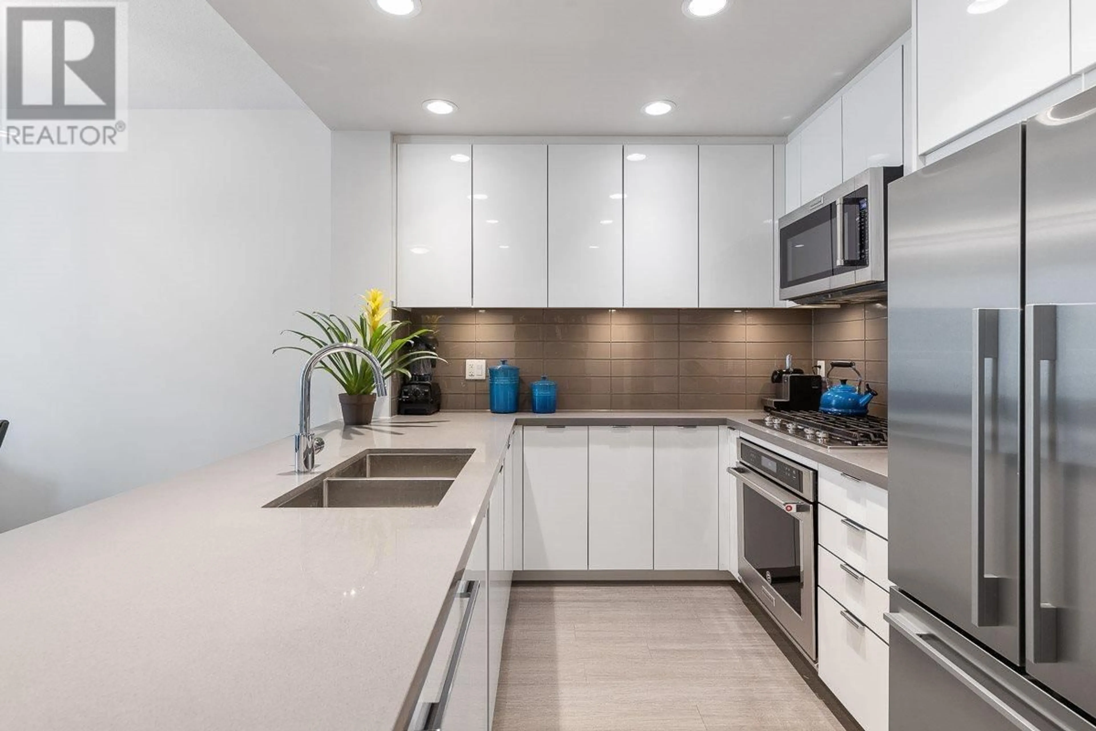 Contemporary kitchen, ceramic/tile floor for 413 - 255 1ST STREET, North Vancouver British Columbia V7M3G8