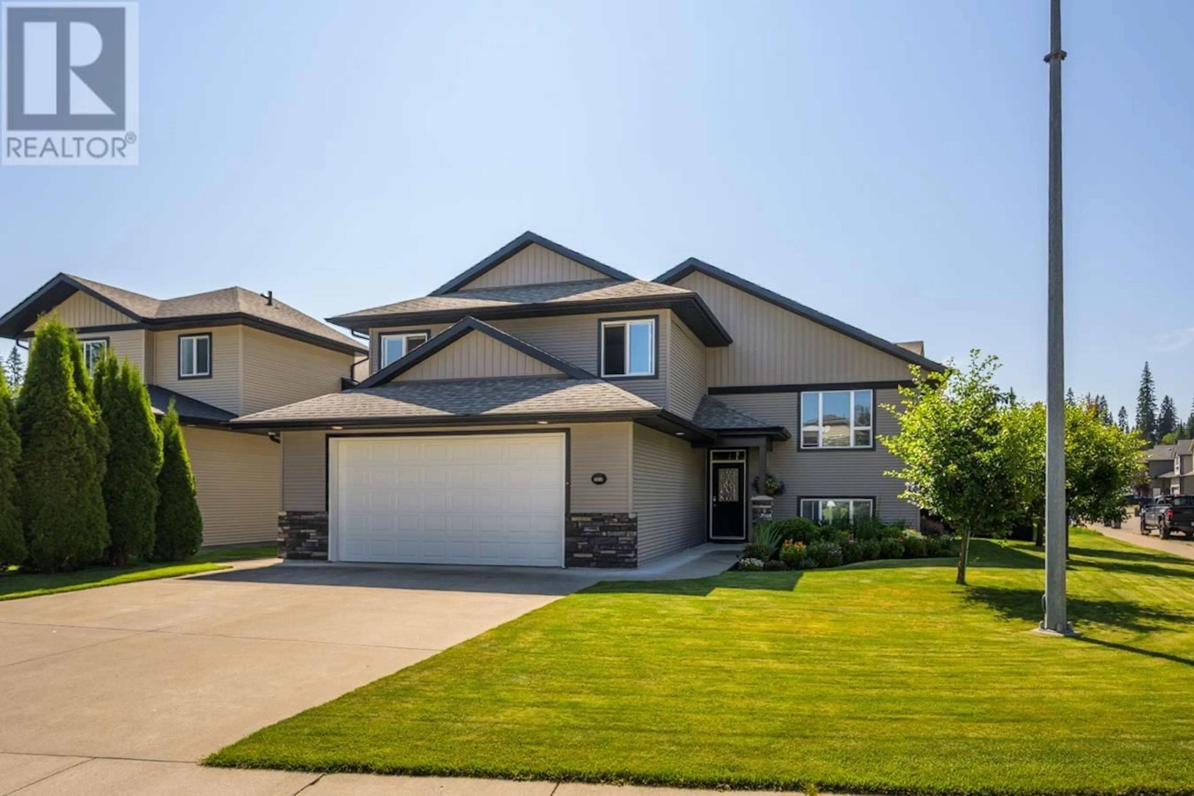 Home with vinyl exterior material, street for 7517 STILLWATER CRESCENT, Prince George British Columbia V2N0C2