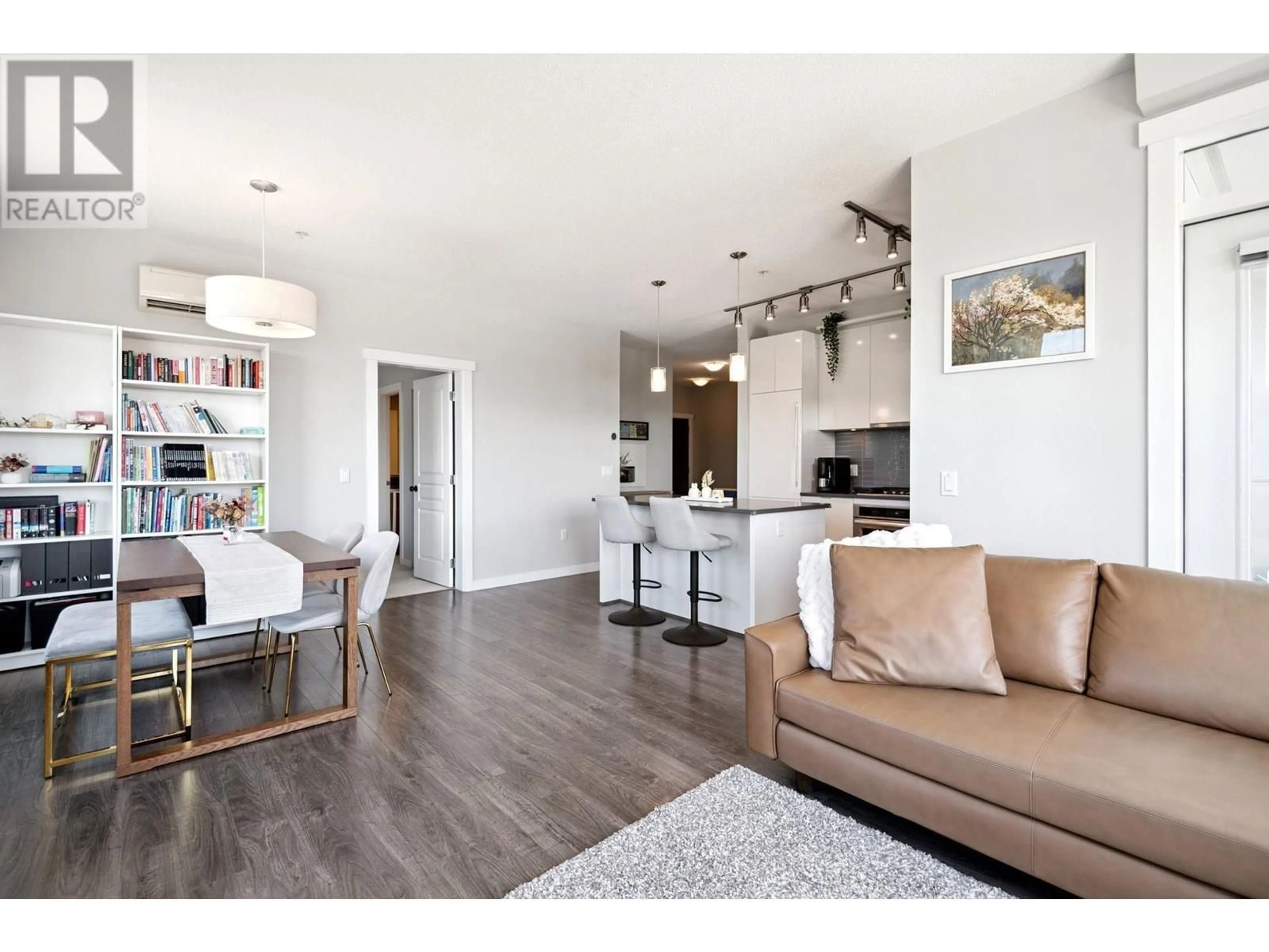 Open concept kitchen, wood/laminate floor for 523 - 9311 ALEXANDRA ROAD, Richmond British Columbia V6X0L8