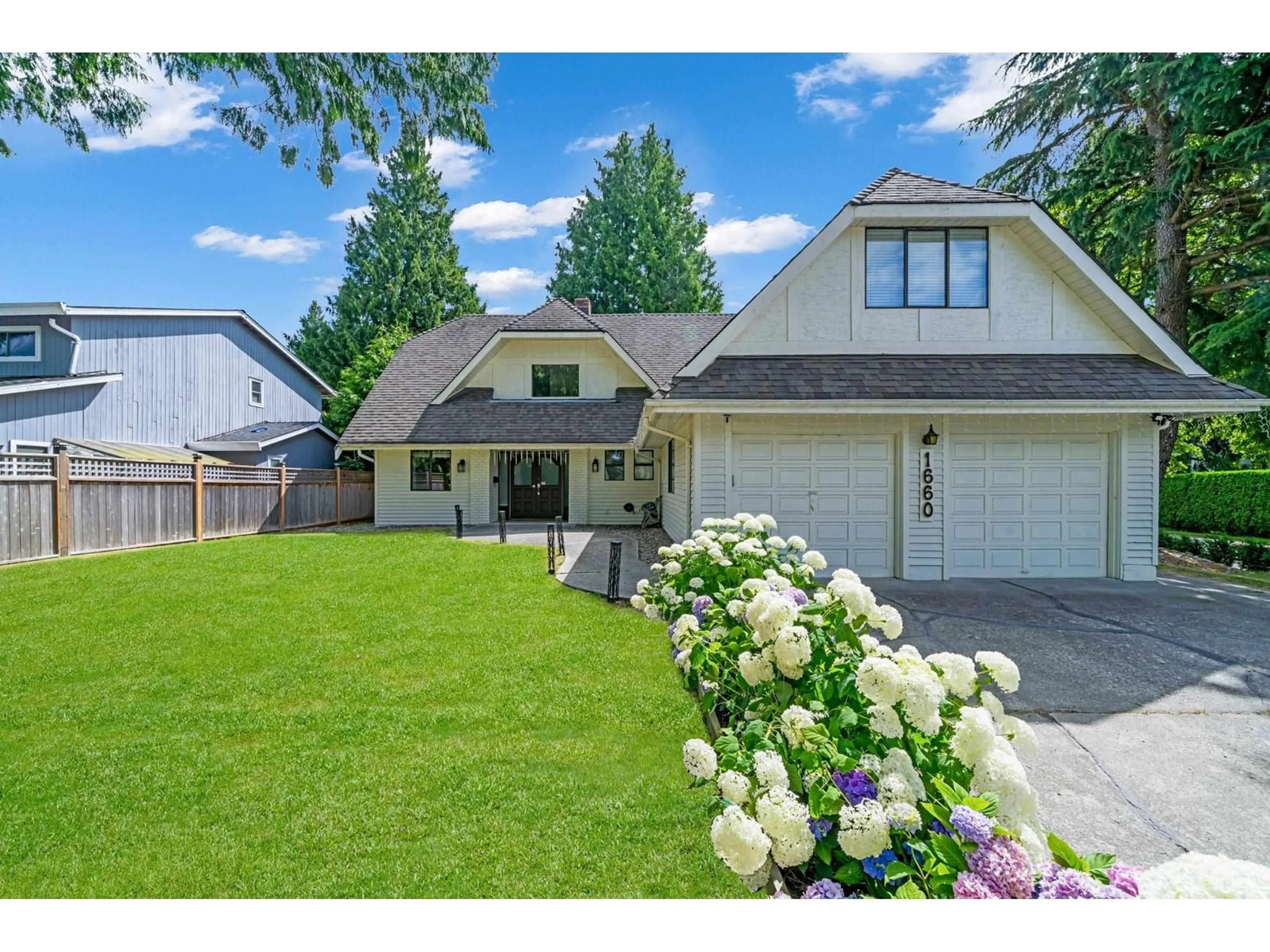 Home with vinyl exterior material, street for 1660 145, Surrey British Columbia V4A5S3