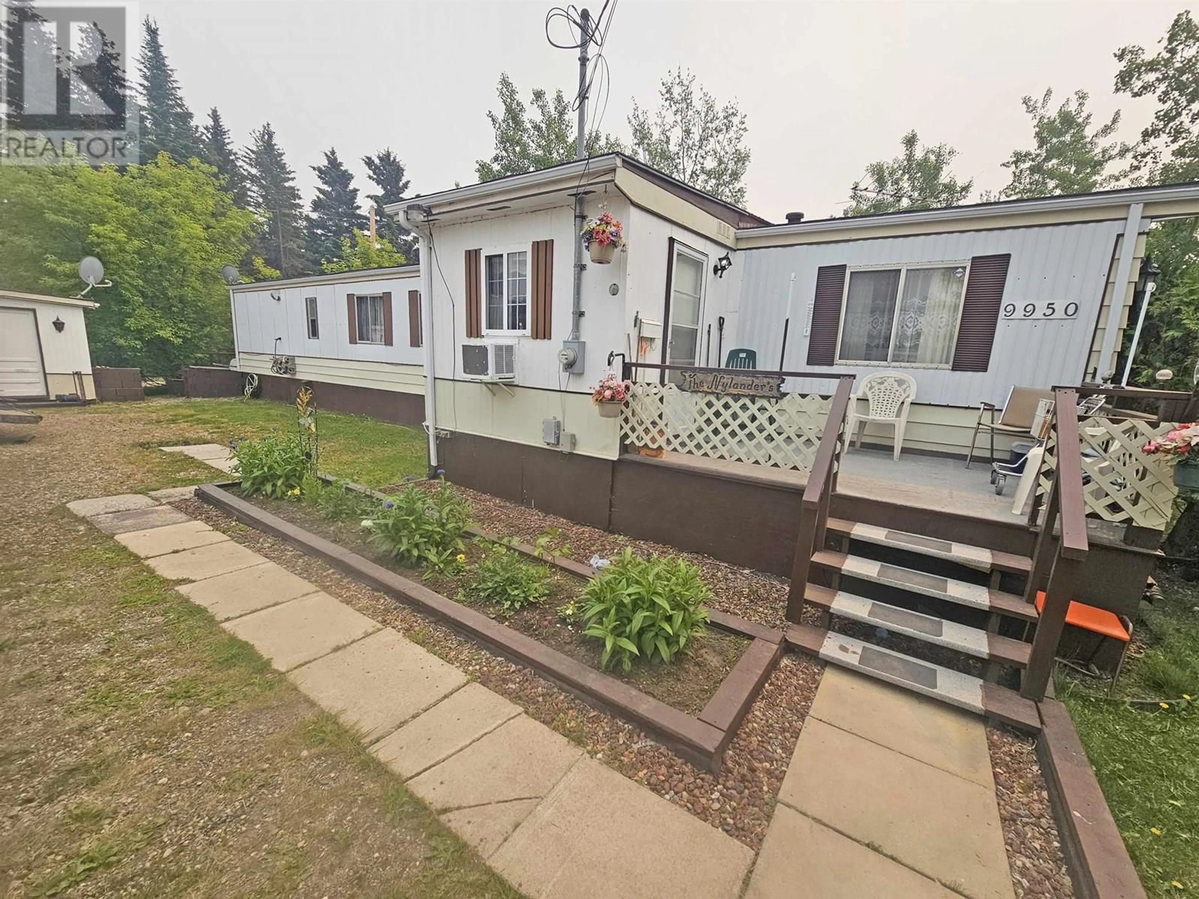 A pic from outside/outdoor area/front of a property/back of a property/a pic from drone, street for 9950 MAPLE STREET, Fort St. John British Columbia V1J4M6