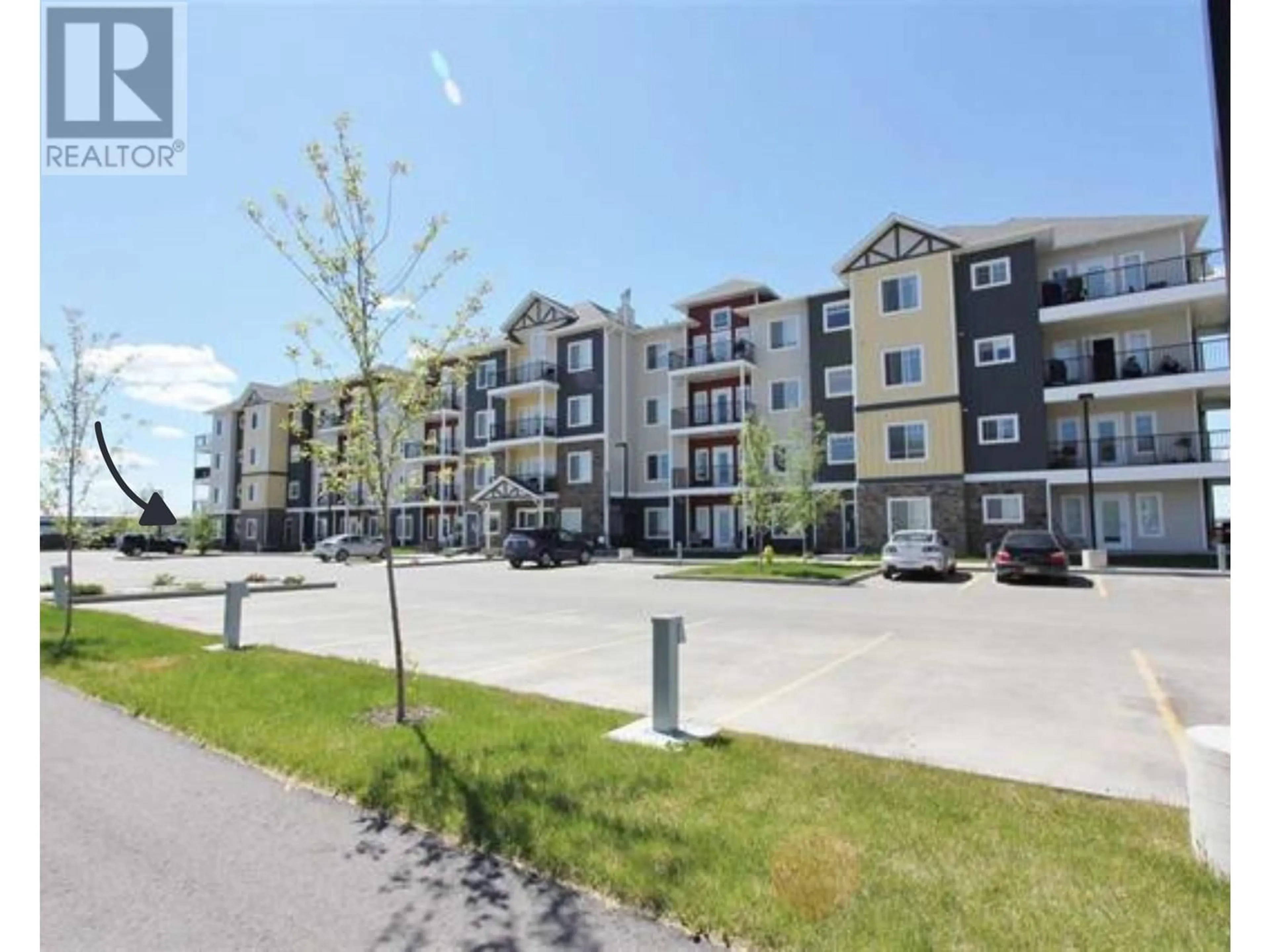 A pic from outside/outdoor area/front of a property/back of a property/a pic from drone, unknown for 106 - 11205 105 AVENUE, Fort St. John British Columbia V1J0L3