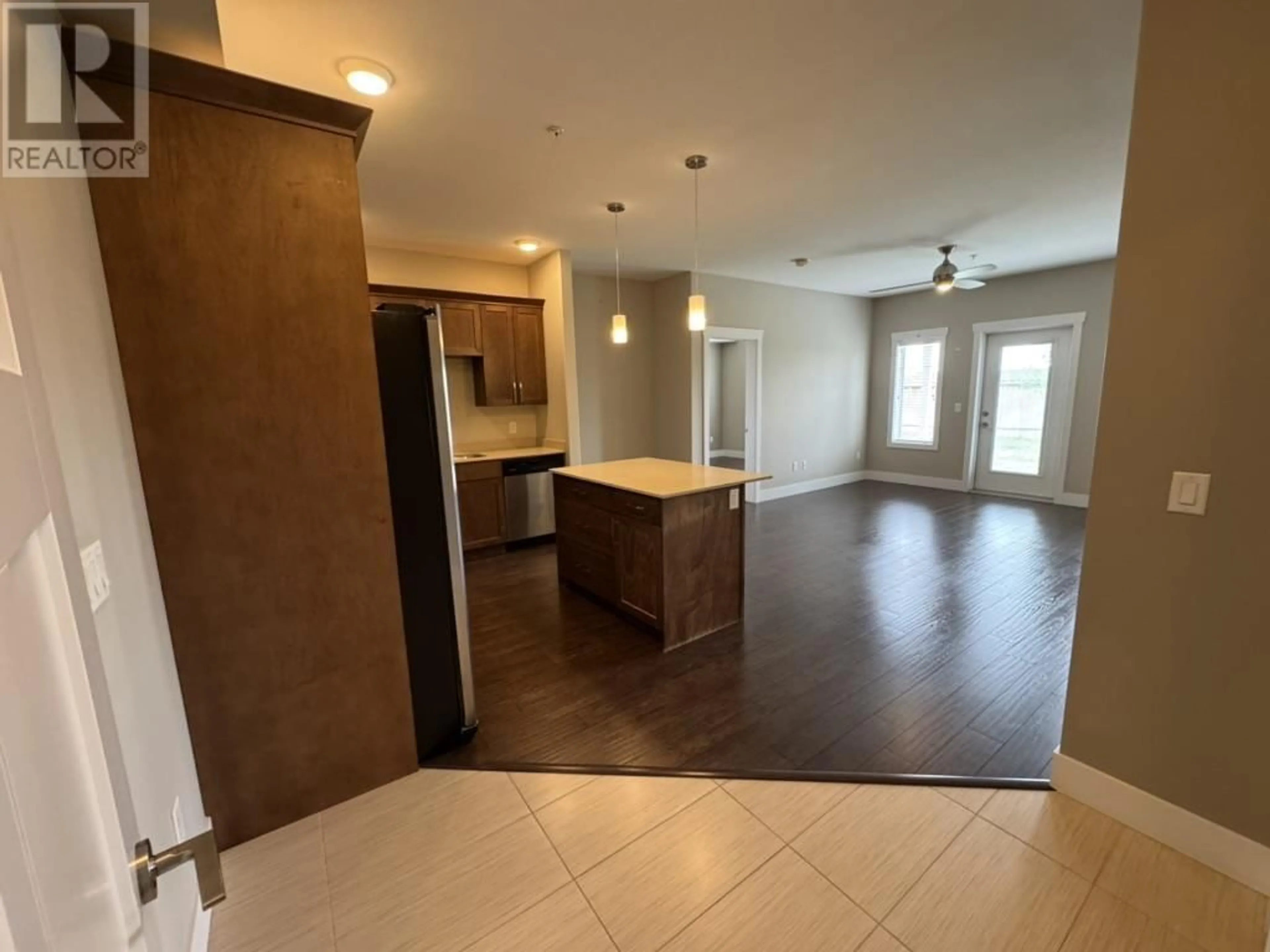 Open concept kitchen, unknown for 106 - 11205 105 AVENUE, Fort St. John British Columbia V1J0L3