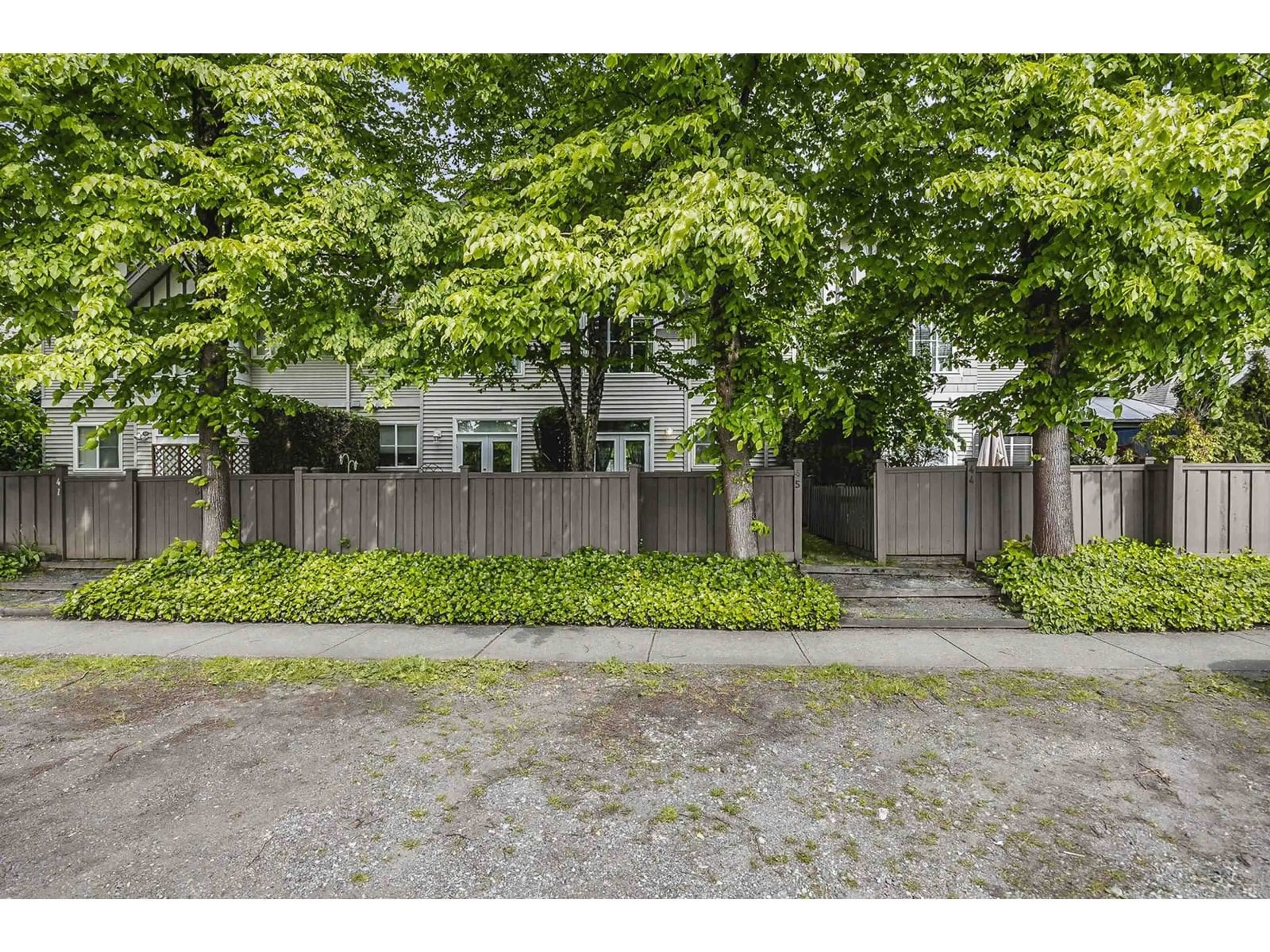 A pic from outside/outdoor area/front of a property/back of a property/a pic from drone, street for 45 - 6465 184A, Surrey British Columbia V3S8X9