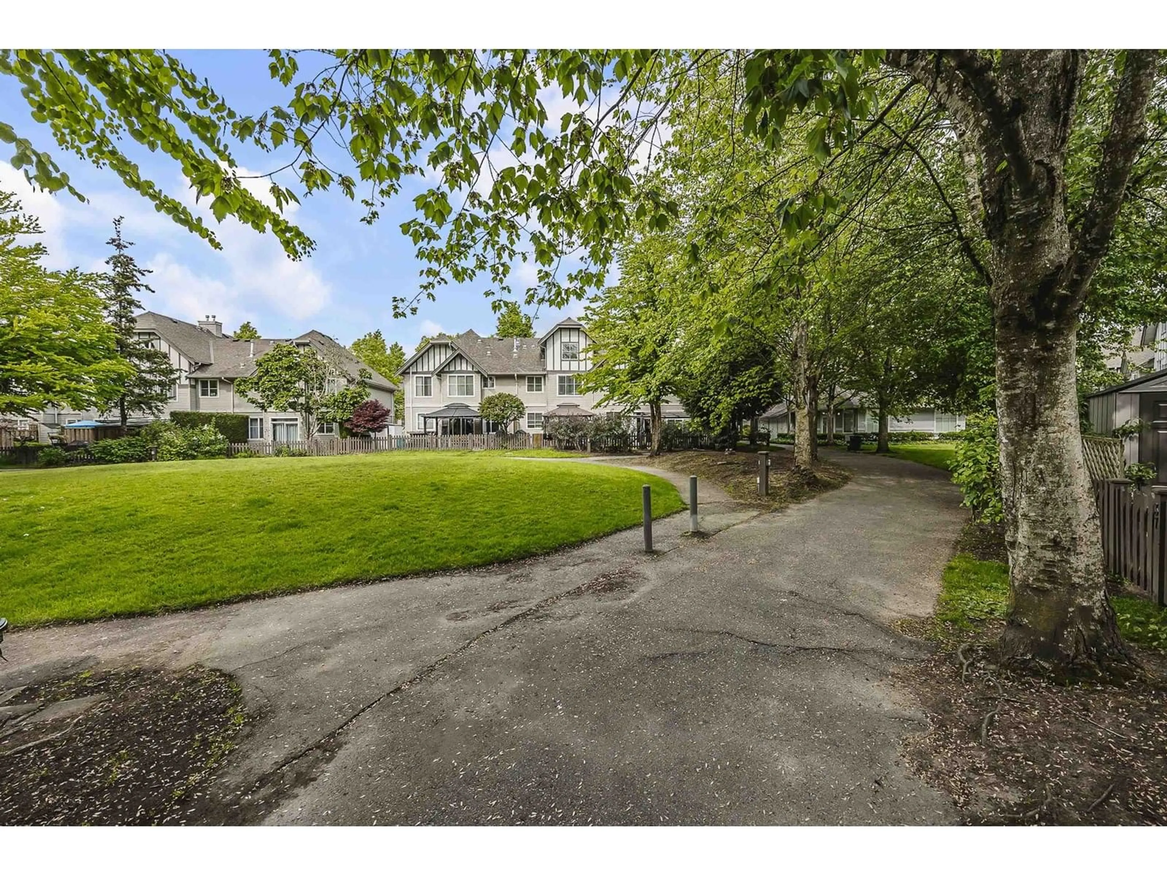 A pic from outside/outdoor area/front of a property/back of a property/a pic from drone, street for 45 - 6465 184A, Surrey British Columbia V3S8X9