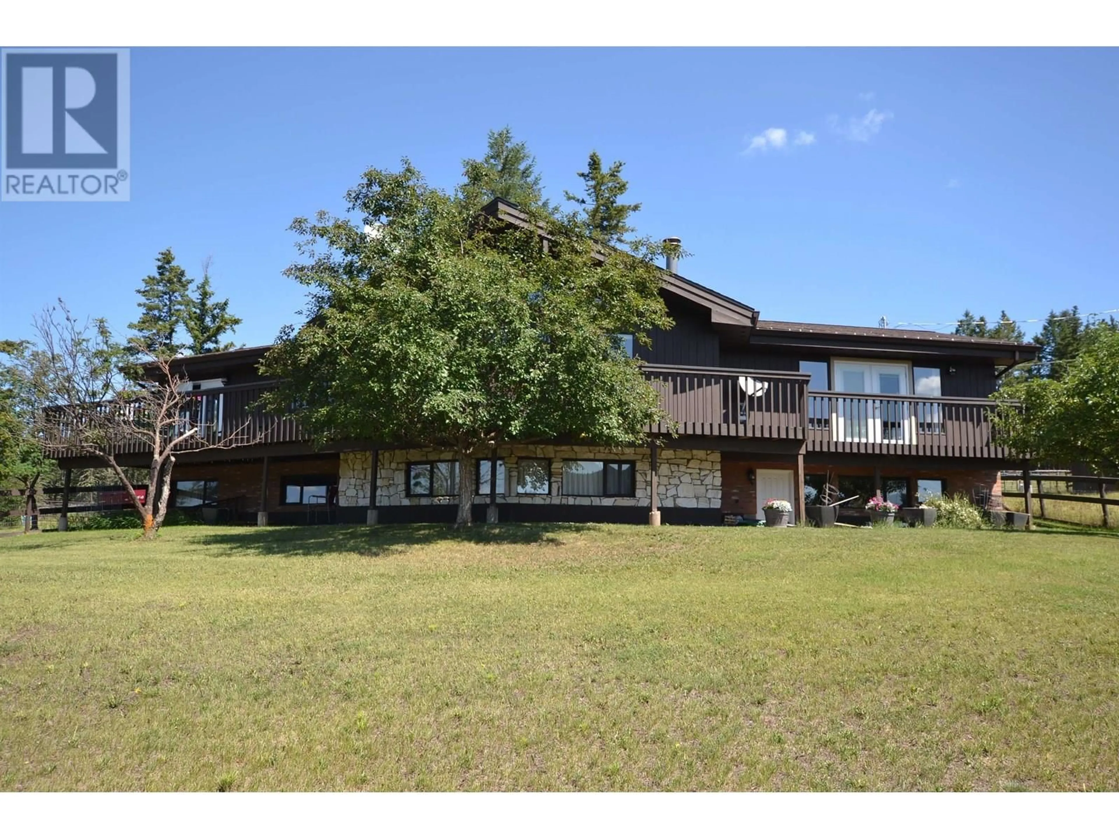A pic from outside/outdoor area/front of a property/back of a property/a pic from drone, water/lake/river/ocean view for 1747 CHIMNEY LAKE ROAD, Williams Lake British Columbia V2G4W2