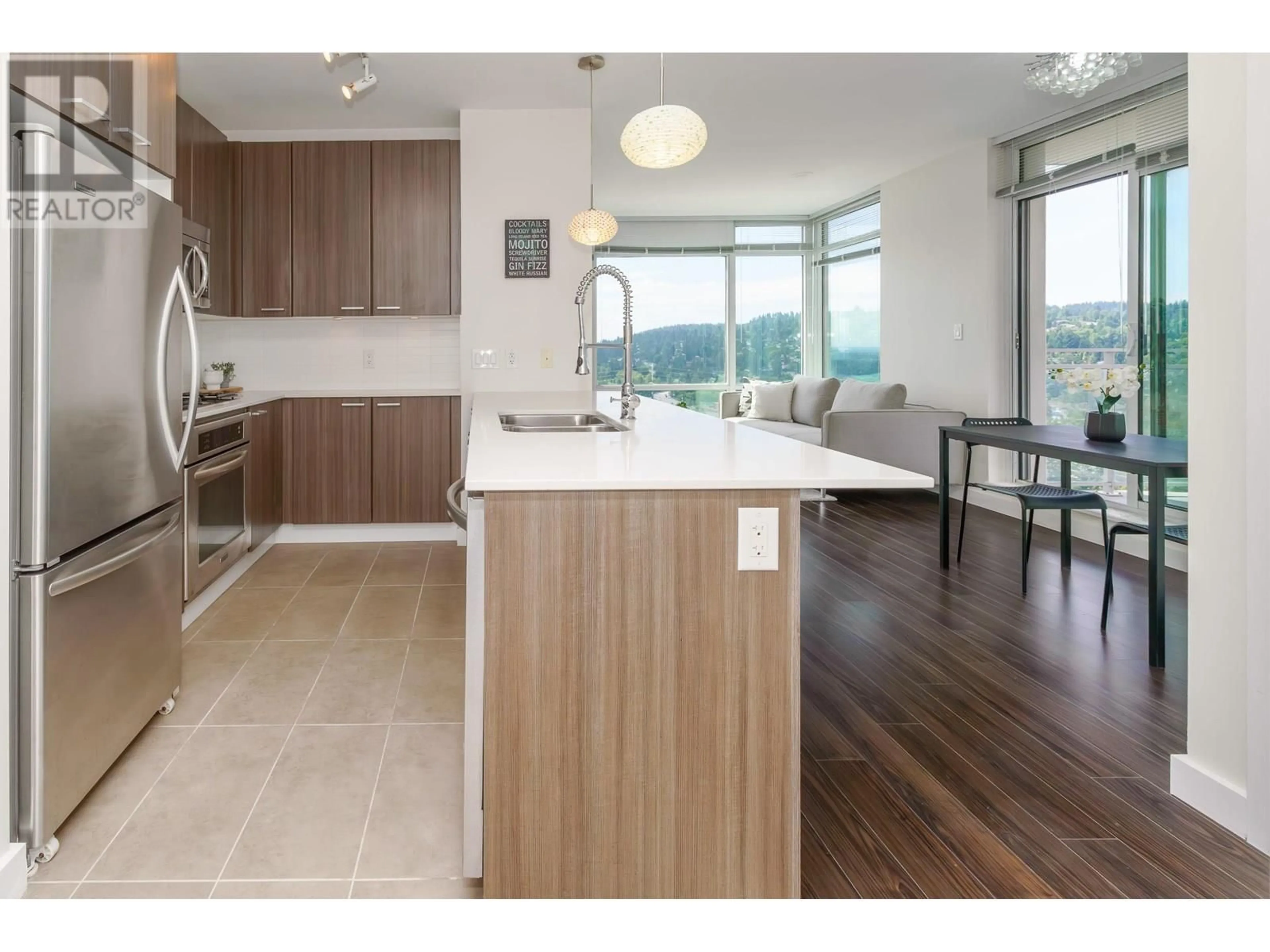 Open concept kitchen, wood/laminate floor for 2307 - 2955 ATLANTIC AVENUE, Coquitlam British Columbia V3B0H9