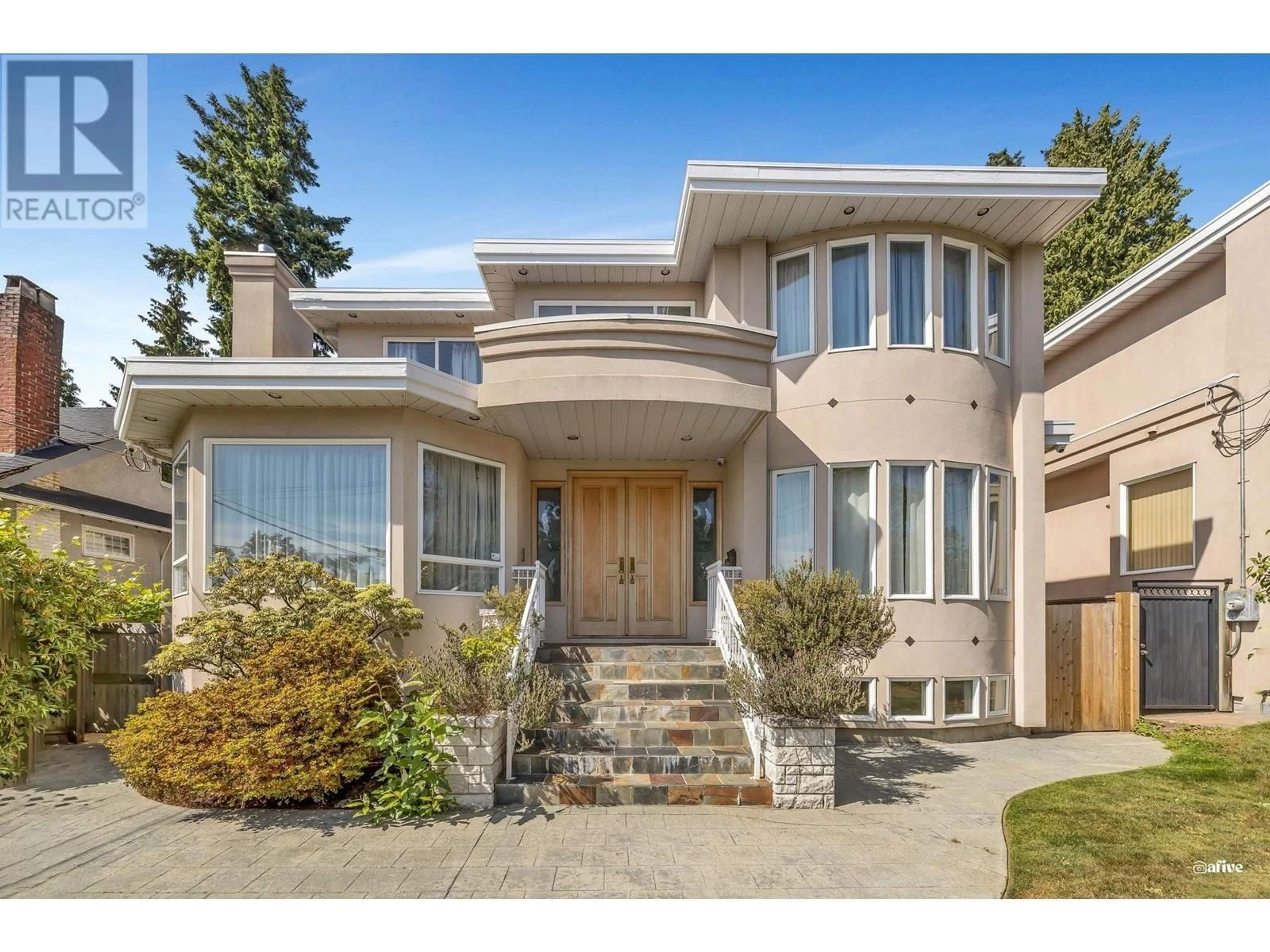 Home with vinyl exterior material, street for 1463 57TH STREET, Vancouver British Columbia V6P1T1