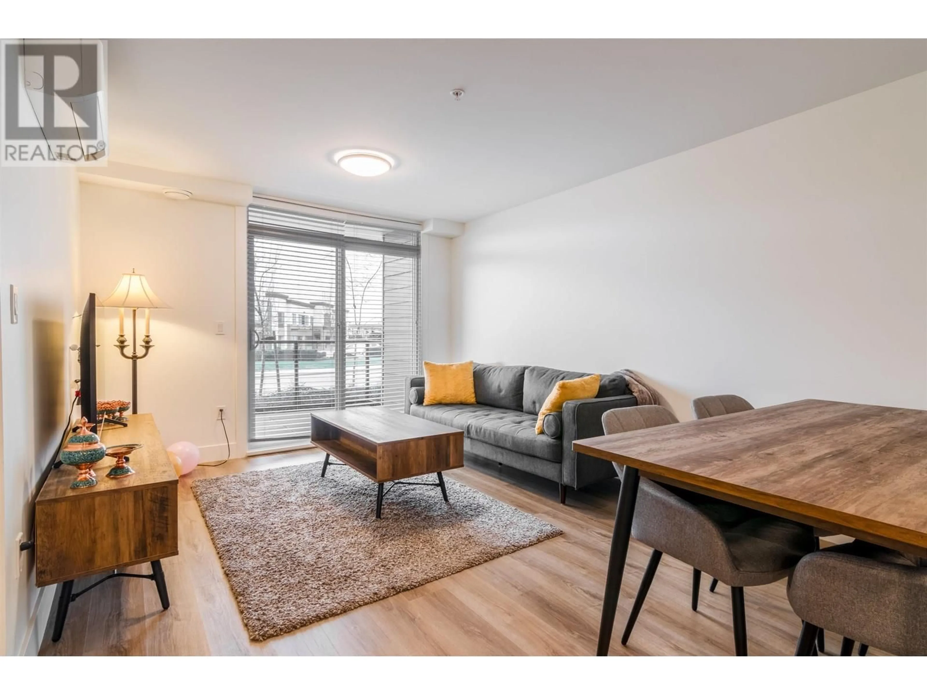 Living room with furniture, wood/laminate floor for 1106 - 2180 KELLY AVENUE, Port Coquitlam British Columbia V3C0B1