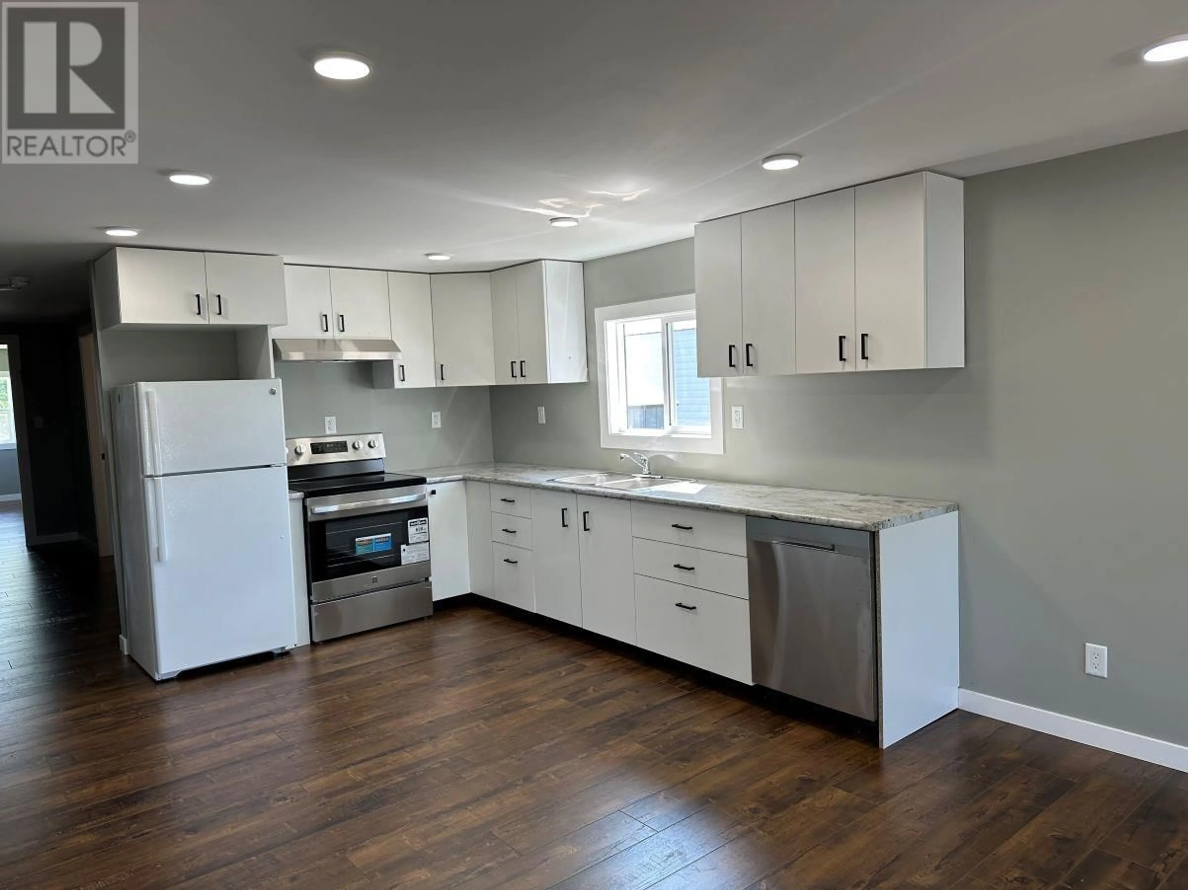 Open concept kitchen, wood/laminate floor for 6 - 6151 GAUTHIER ROAD, Prince George British Columbia V2N5M5