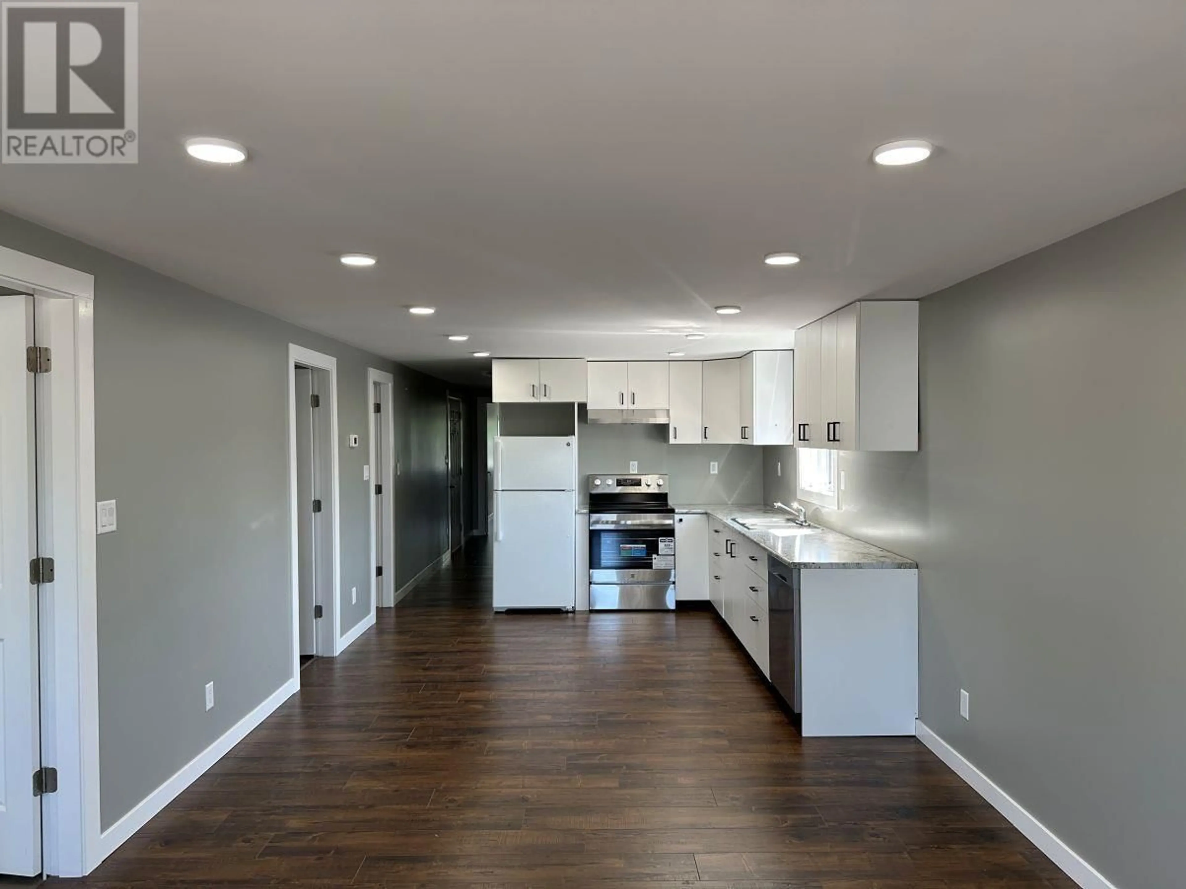 Open concept kitchen, wood/laminate floor for 6 - 6151 GAUTHIER ROAD, Prince George British Columbia V2N5M5