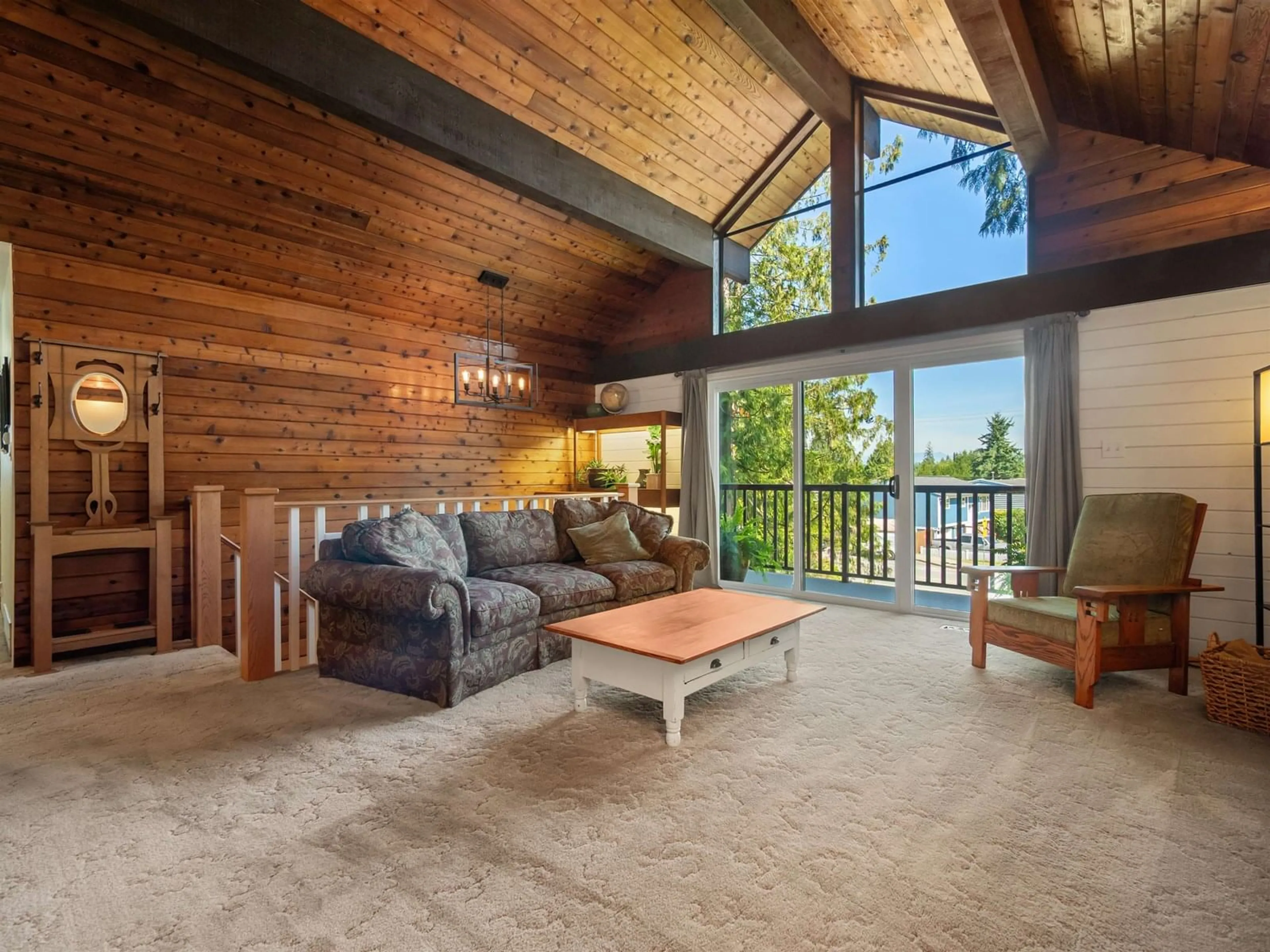 Living room with furniture, wood/laminate floor for 20560 48, Langley British Columbia V3A3L6