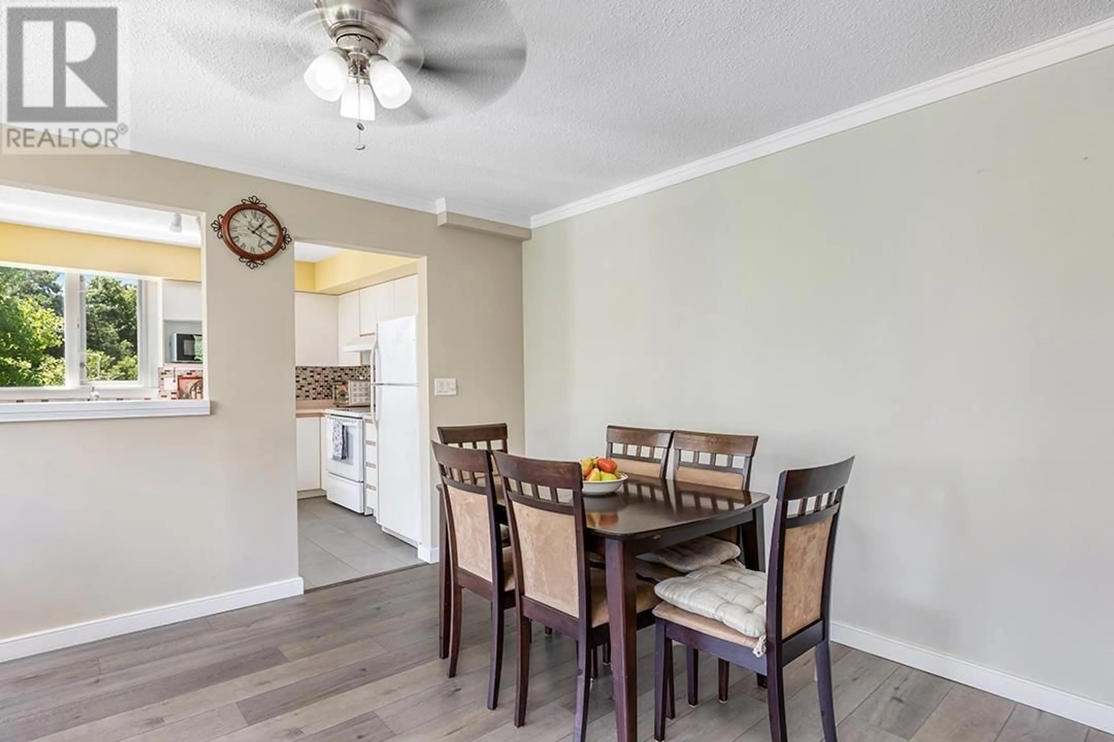 Dining room, wood/laminate floor for 402 - 7321 HALIFAX STREET, Burnaby British Columbia V5A4R5