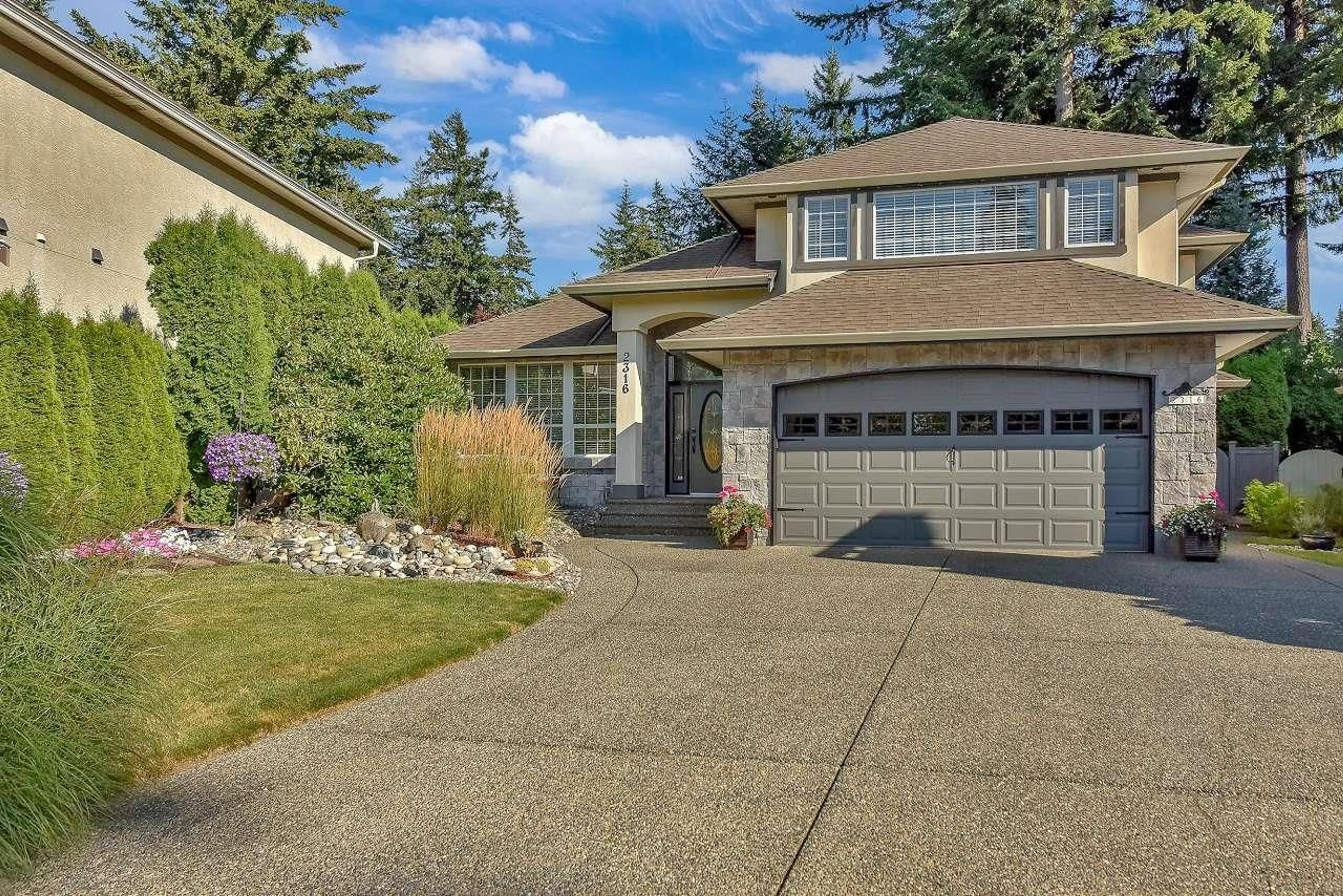 Home with vinyl exterior material, street for 2316 140A, Surrey British Columbia V4A9V3