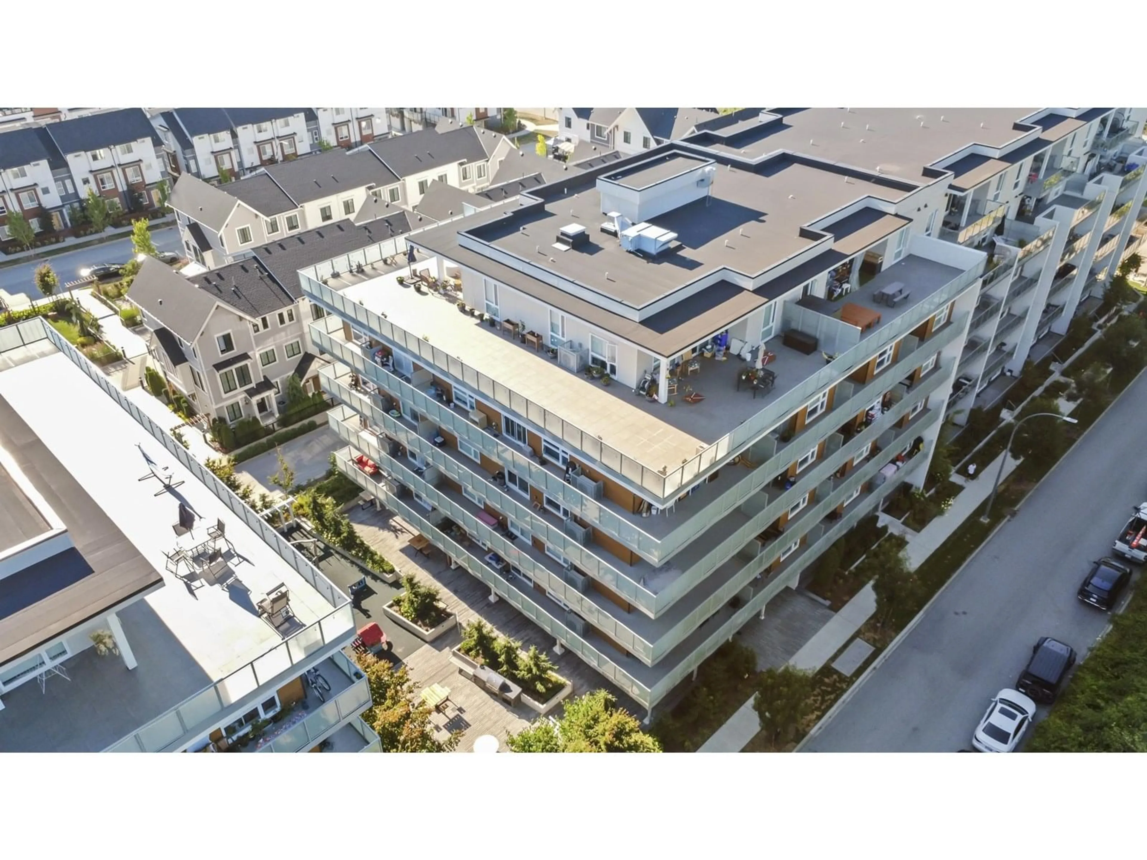 A pic from outside/outdoor area/front of a property/back of a property/a pic from drone, city buildings view from balcony for B413 - 8447 202, Langley British Columbia V2Y4K2