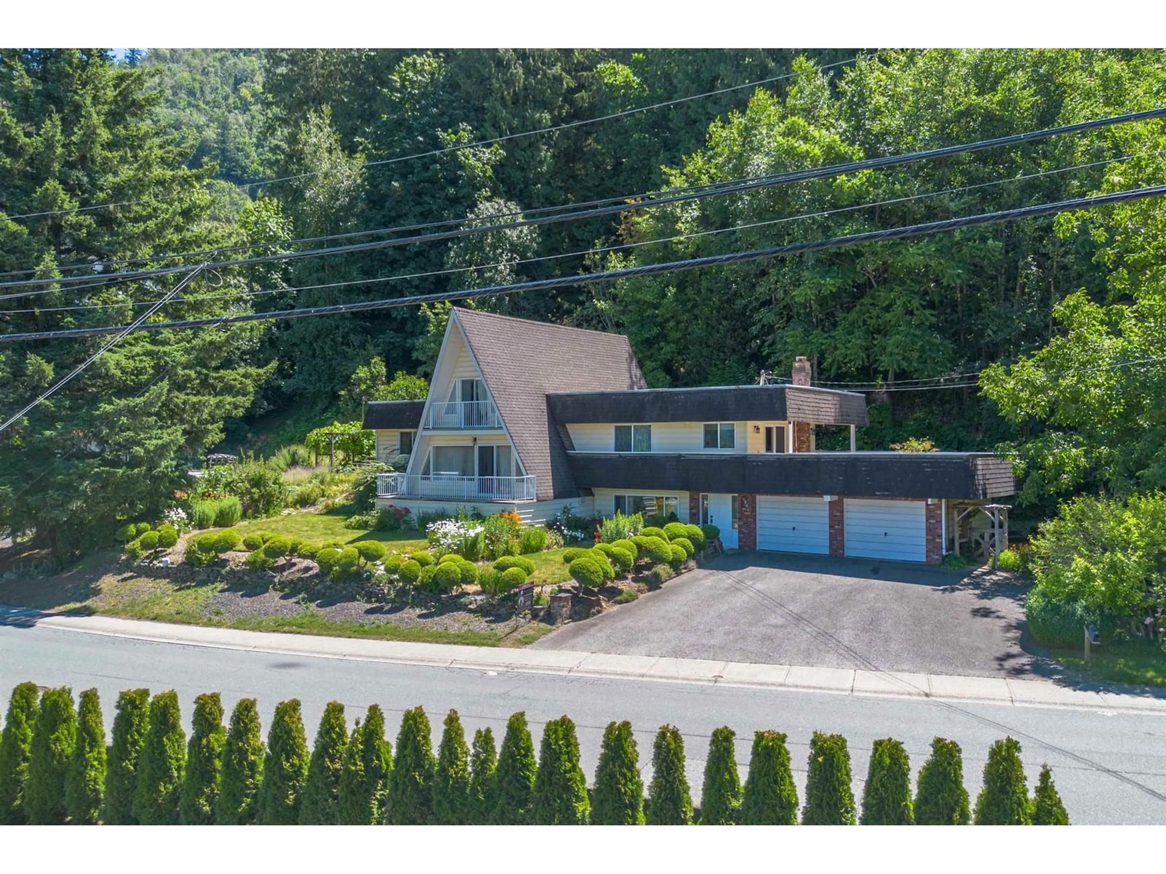 A pic from outside/outdoor area/front of a property/back of a property/a pic from drone, unknown for 5806 JINKERSON ROAD, Chilliwack British Columbia V2R0C8