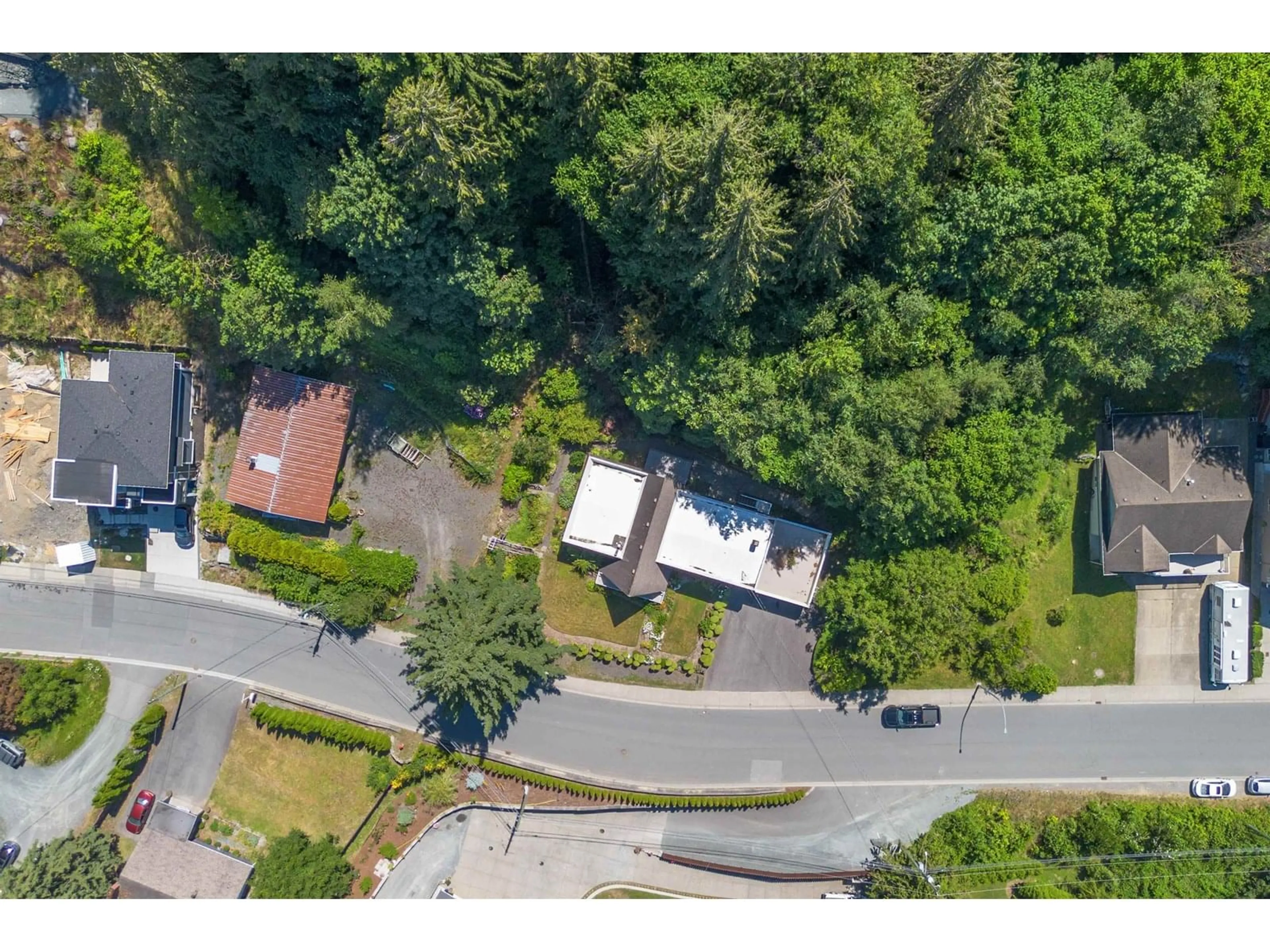A pic from outside/outdoor area/front of a property/back of a property/a pic from drone, street for 5806 JINKERSON ROAD, Chilliwack British Columbia V2R0C8