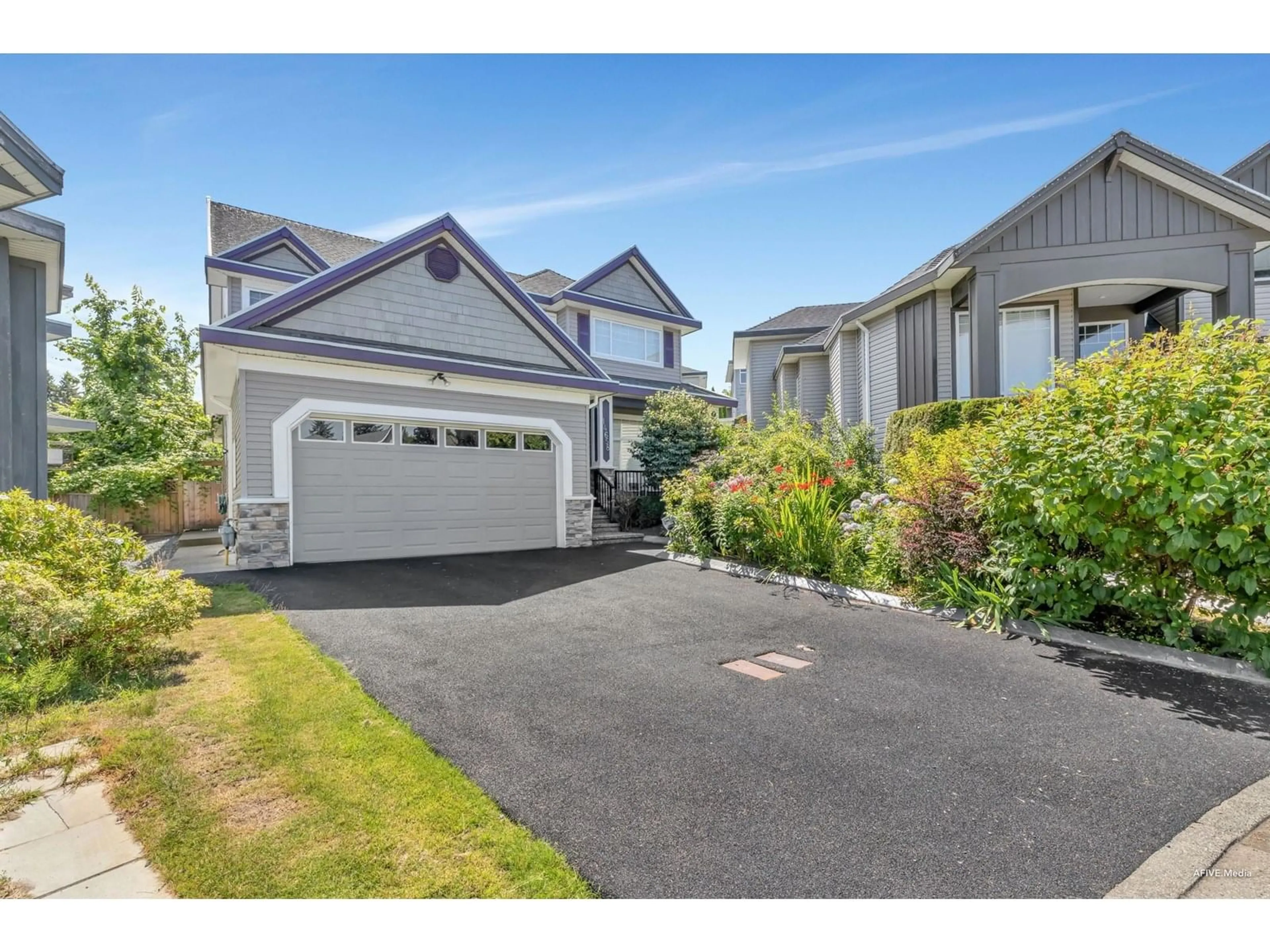 Home with vinyl exterior material, street for 14658 76B, Surrey British Columbia V3S2T3