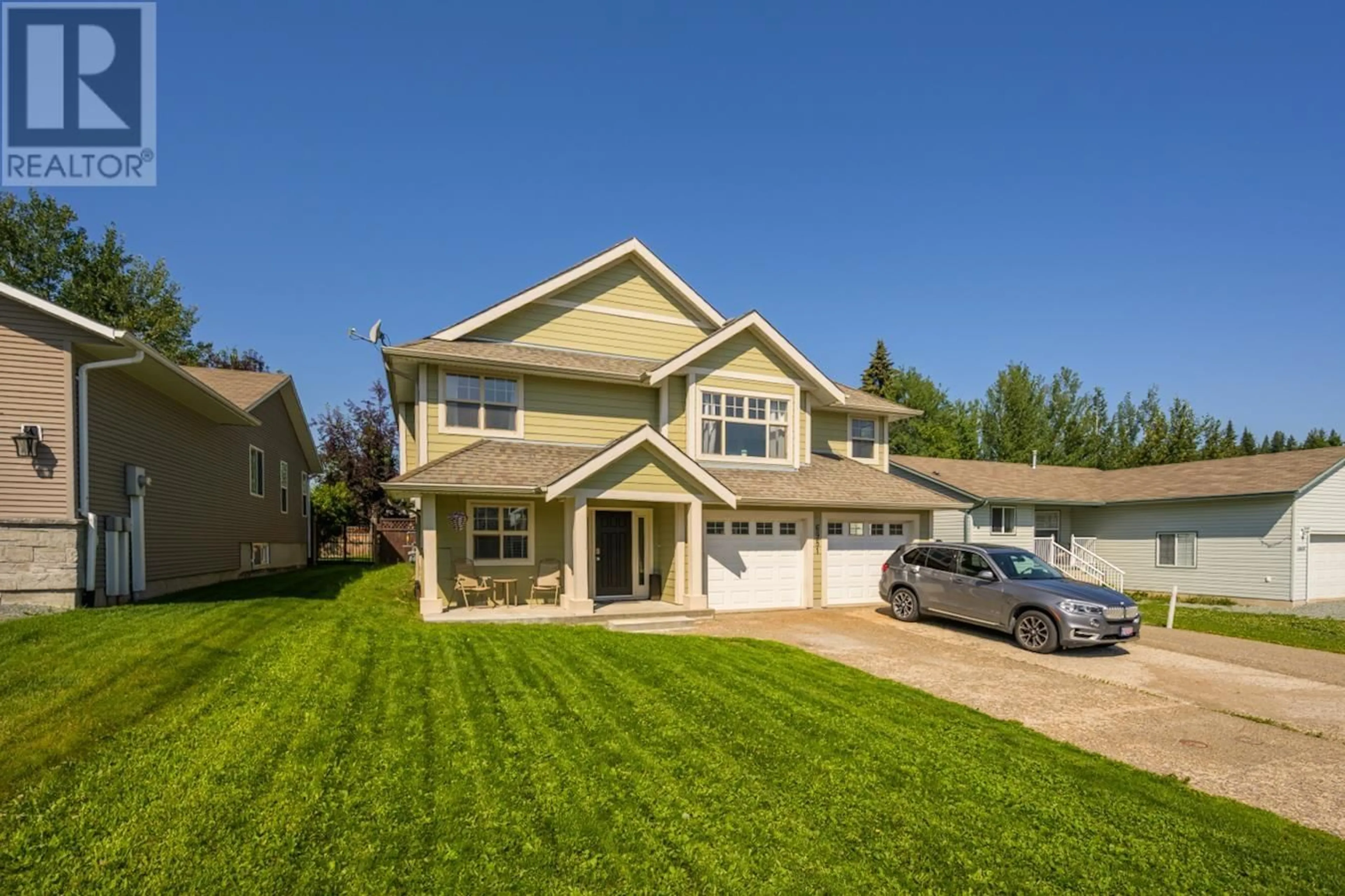 Home with vinyl exterior material, street for 6981 EUGENE ROAD, Prince George British Columbia V2N5P6
