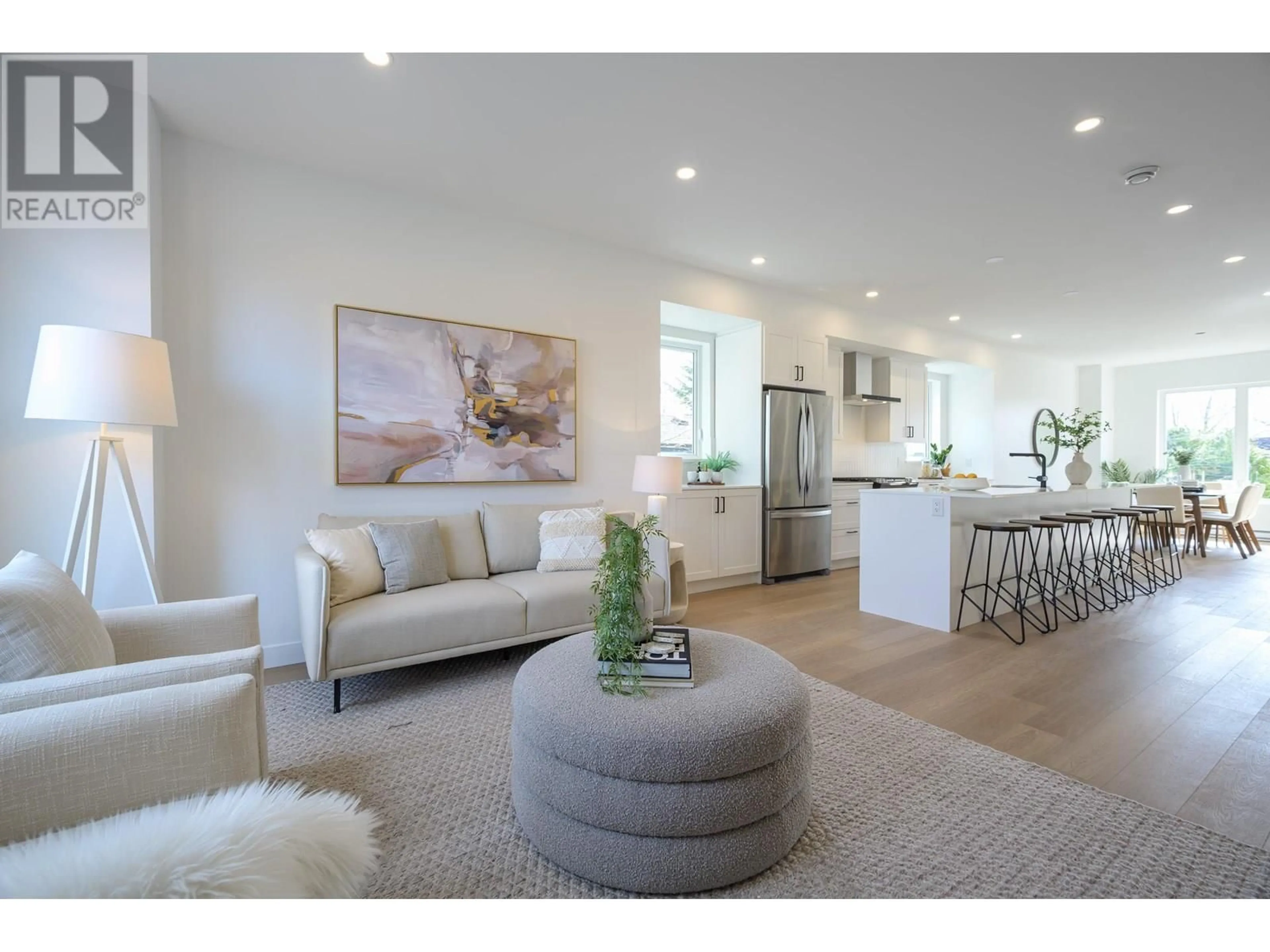 Open concept kitchen, wood/laminate floor for 3 - 4788 54A STREET, Delta British Columbia V4K3P1