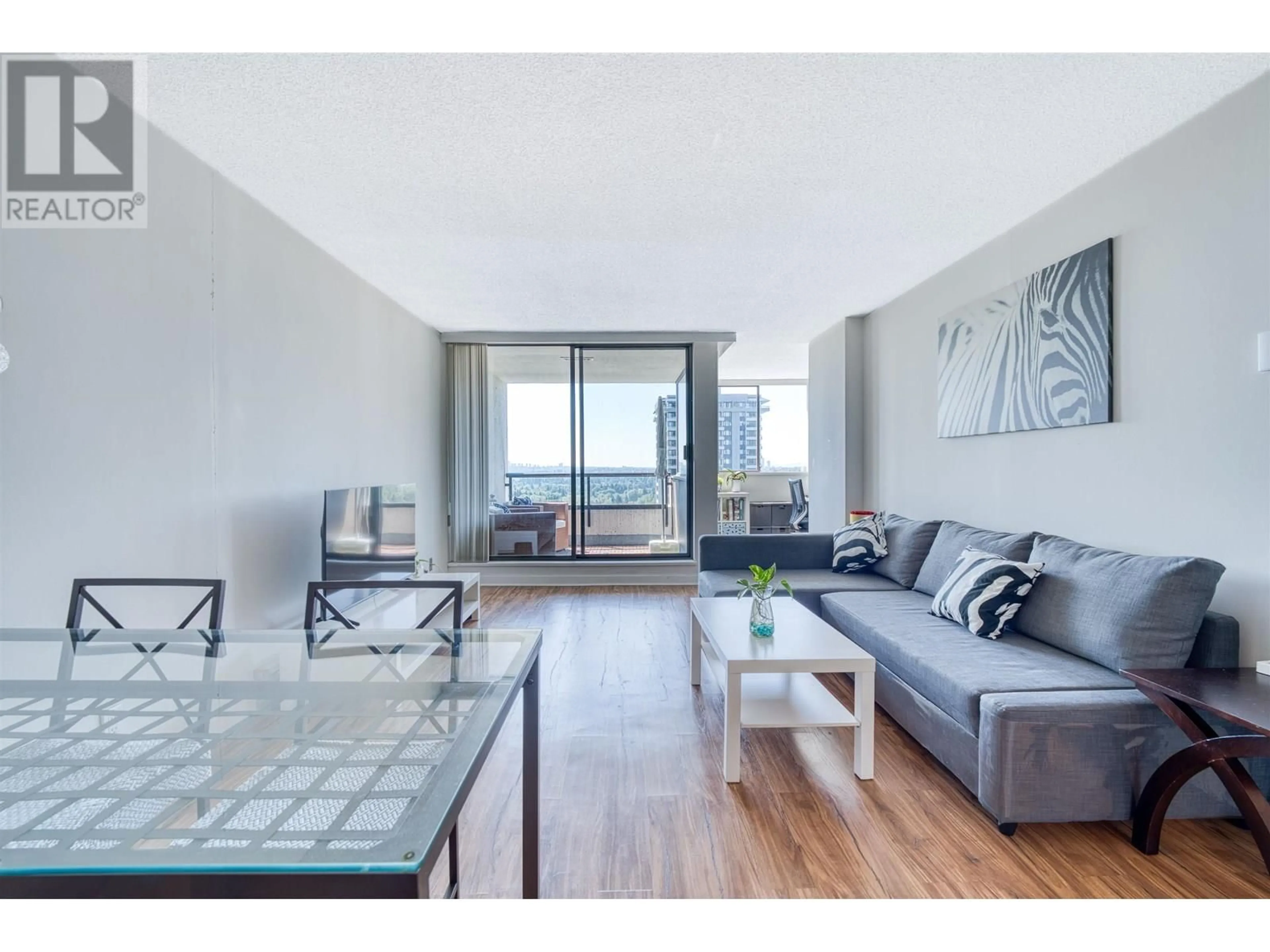Living room with furniture, wood/laminate floor for 2201 - 9521 CARDSTON COURT, Burnaby British Columbia V3N4R8