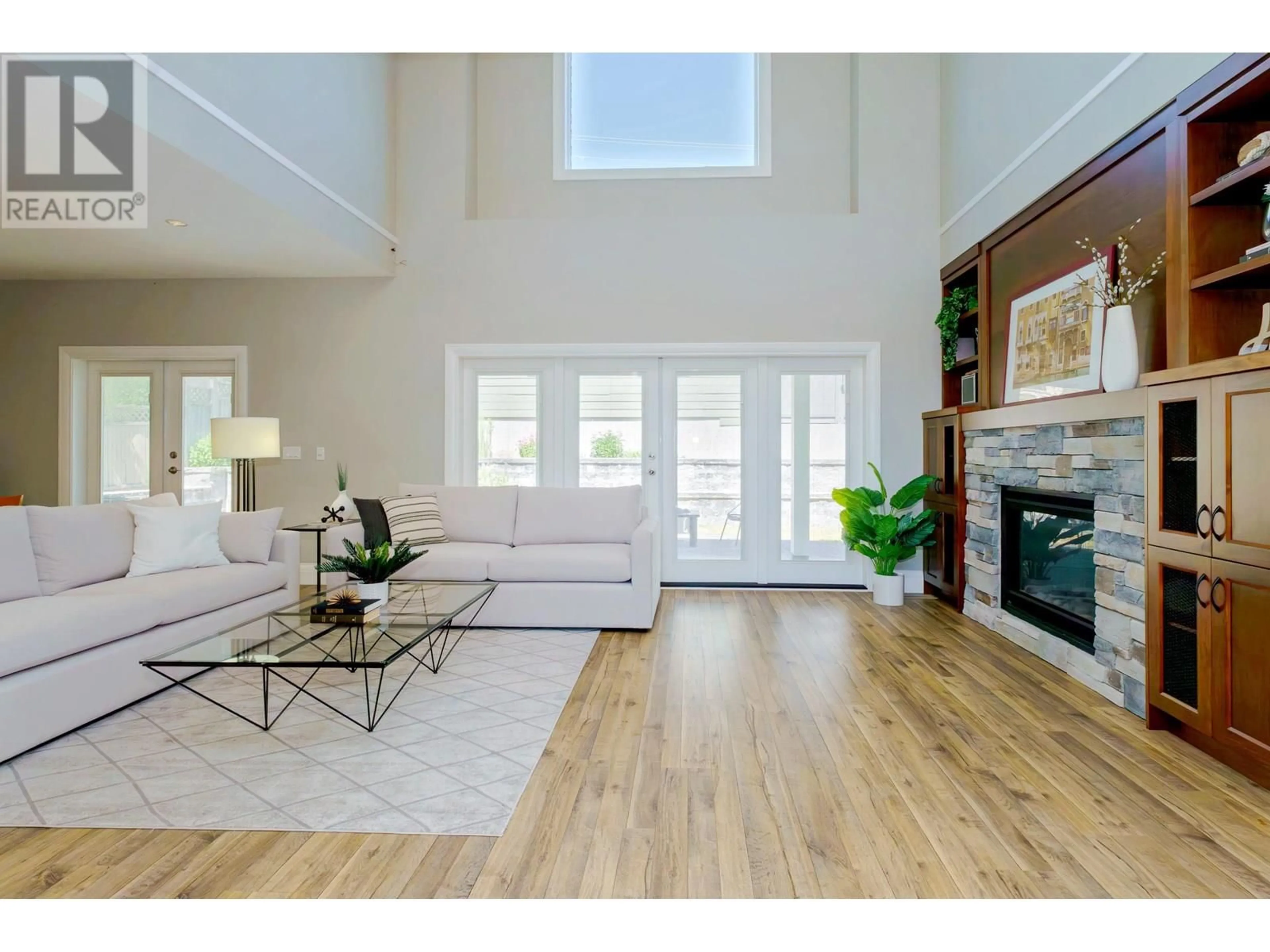 Living room with furniture, wood/laminate floor for 1055 CHARLAND AVENUE, Coquitlam British Columbia V3K3K8