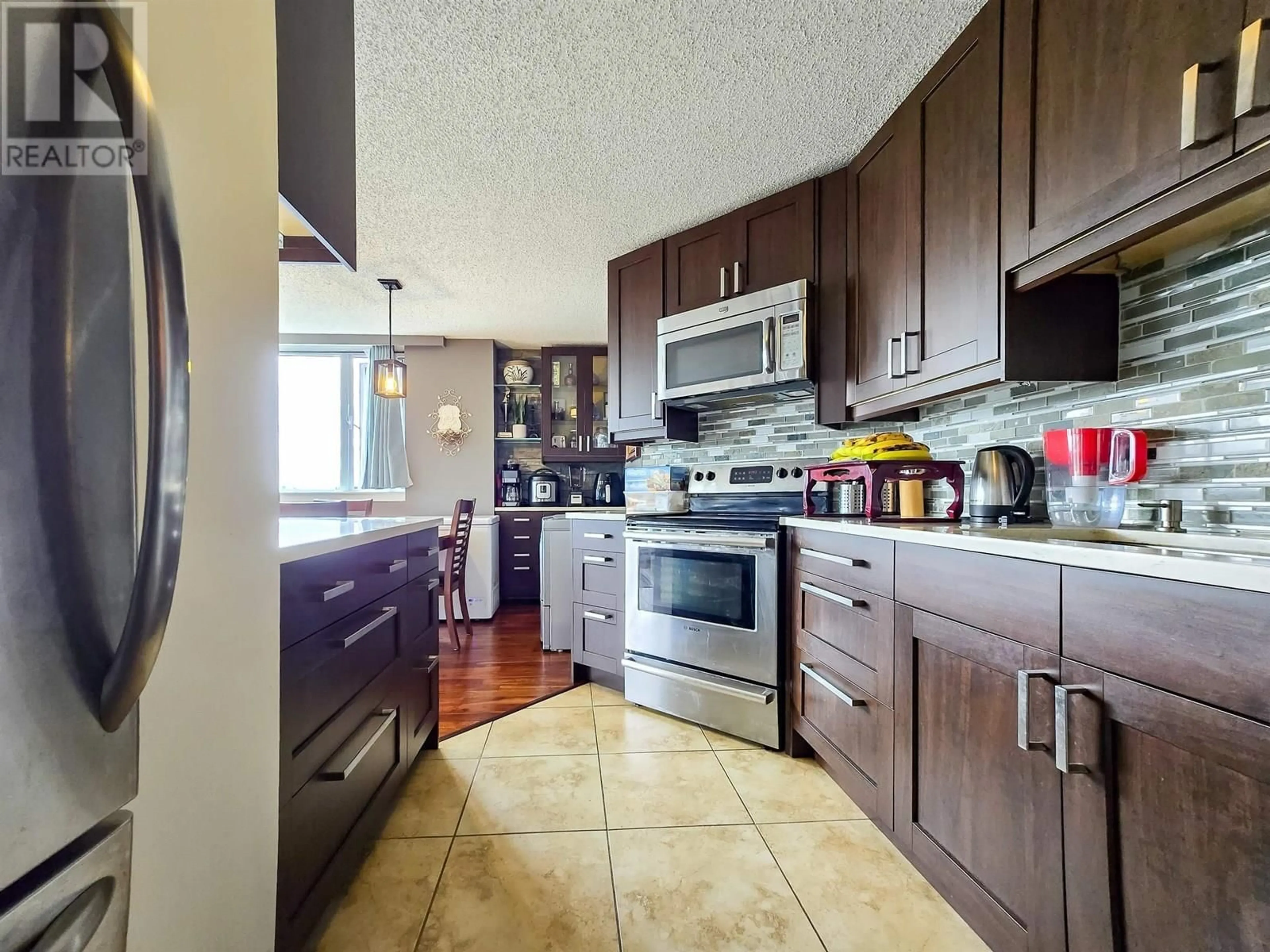 Standard kitchen, ceramic/tile floor for 708 - 3980 CARRIGAN COURT, Burnaby British Columbia V3N4S6