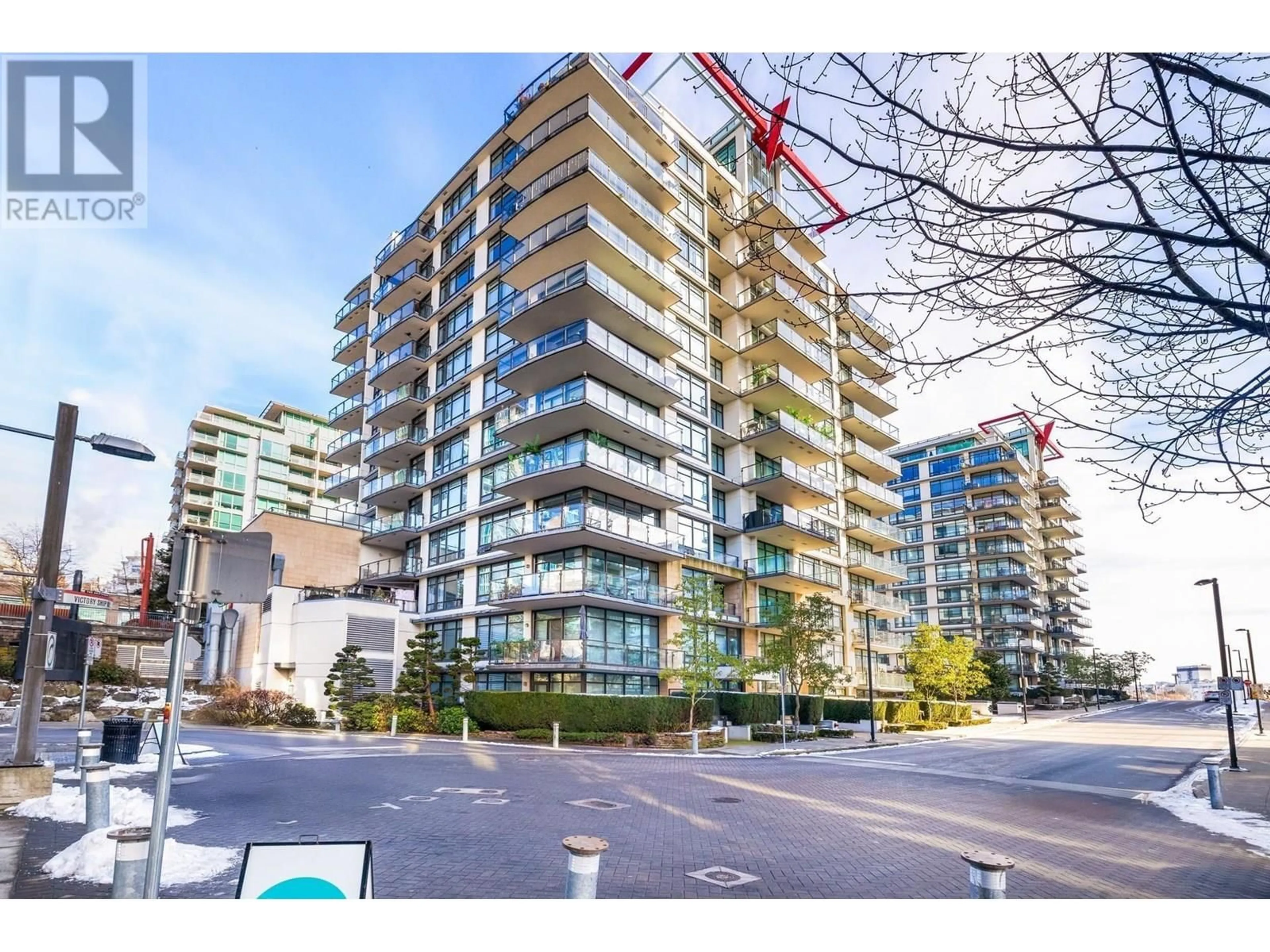 A pic from outside/outdoor area/front of a property/back of a property/a pic from drone, street for 507 - 162 VICTORY SHIP WAY, North Vancouver British Columbia V7L0B4