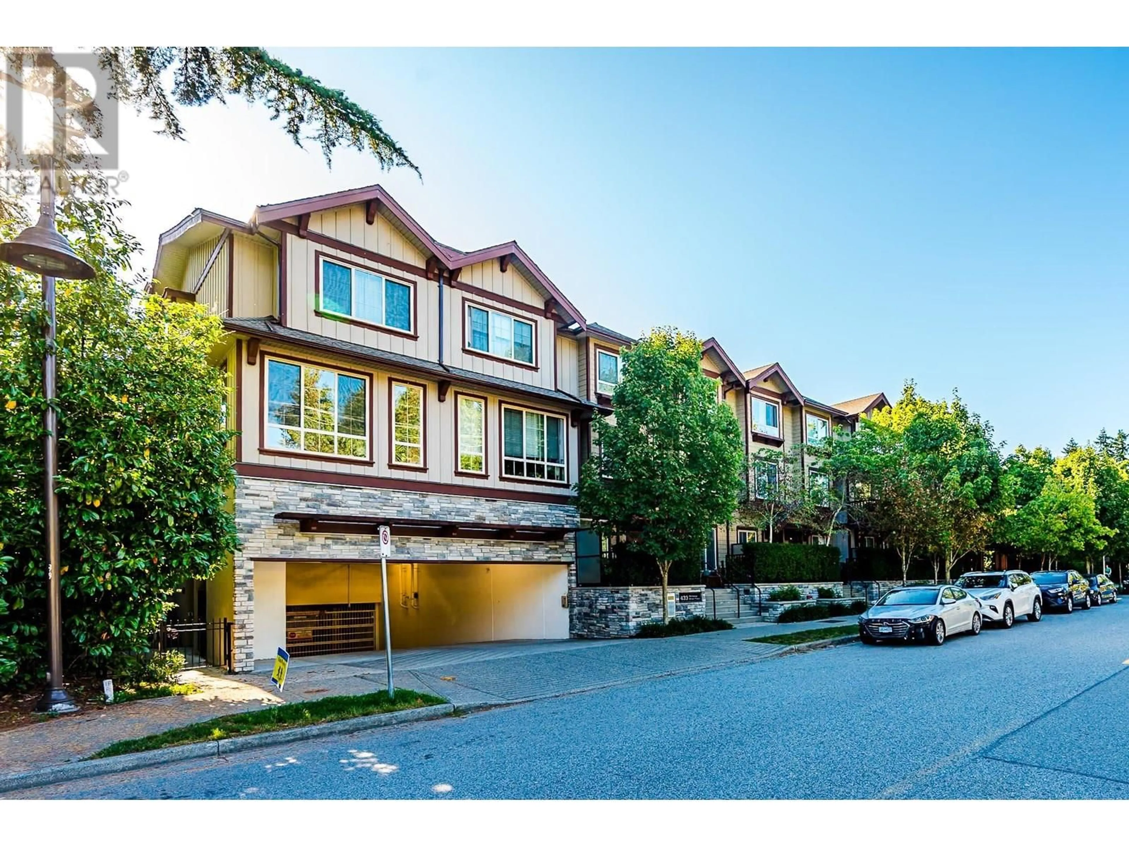 A pic from outside/outdoor area/front of a property/back of a property/a pic from drone, street for 41 - 433 SEYMOUR RIVER PLACE, Vancouver British Columbia V7H0B8