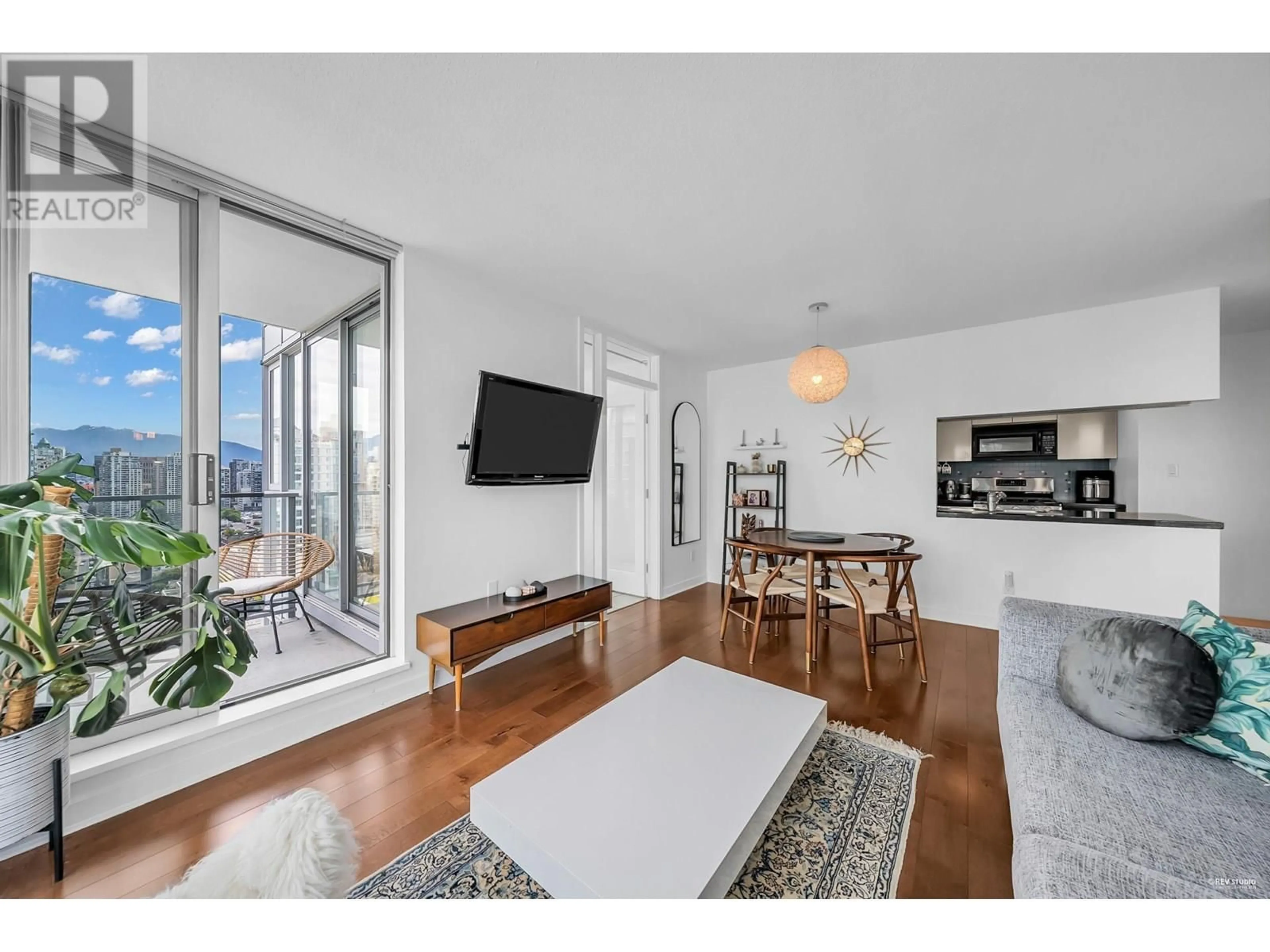 Living room with furniture, wood/laminate floor for 3006 - 1408 STRATHMORE MEWS, Vancouver British Columbia V6Z3A9