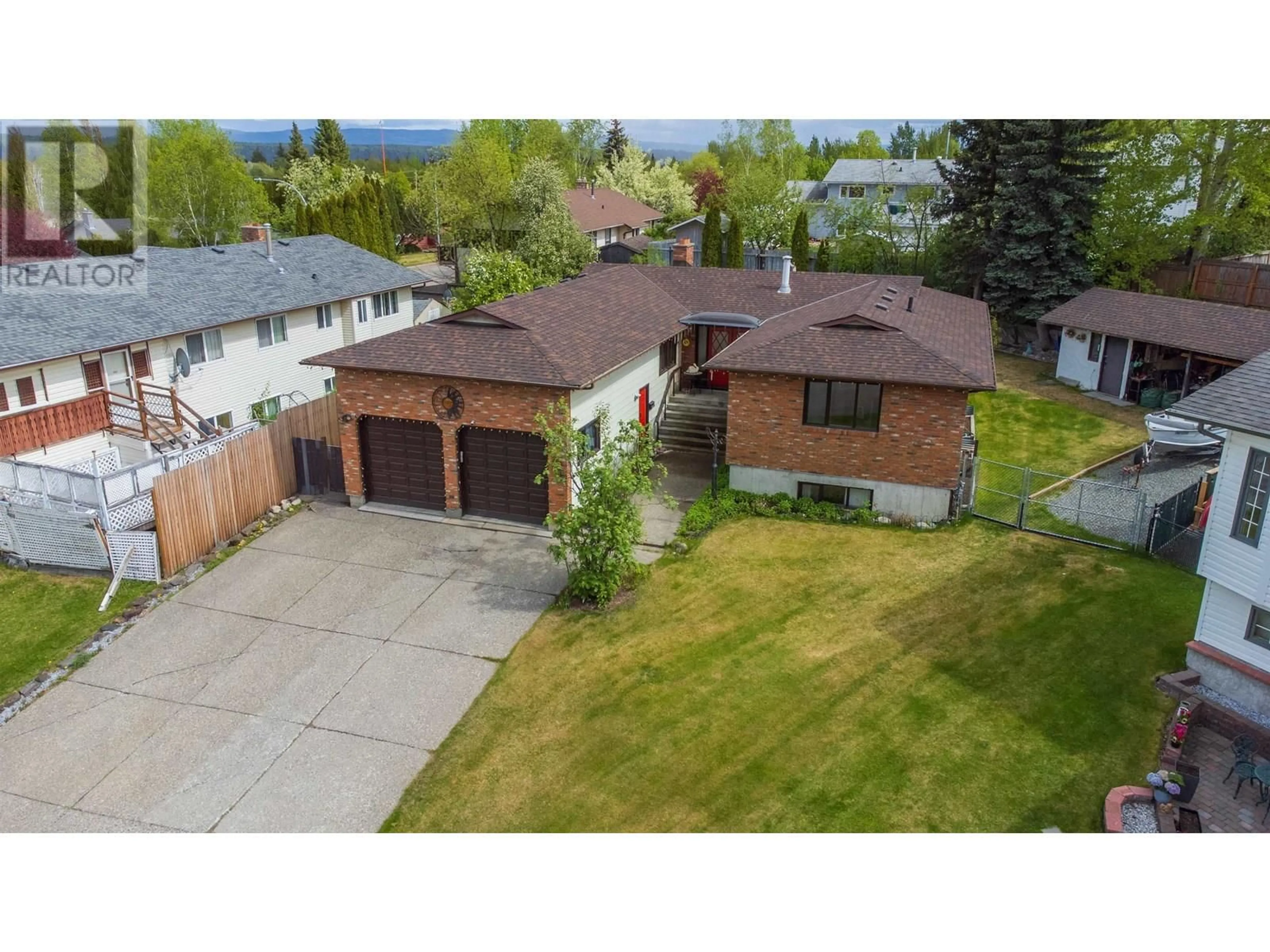 A pic from outside/outdoor area/front of a property/back of a property/a pic from drone, street for 2881 CALHOUN PLACE, Prince George British Columbia V2N5J5