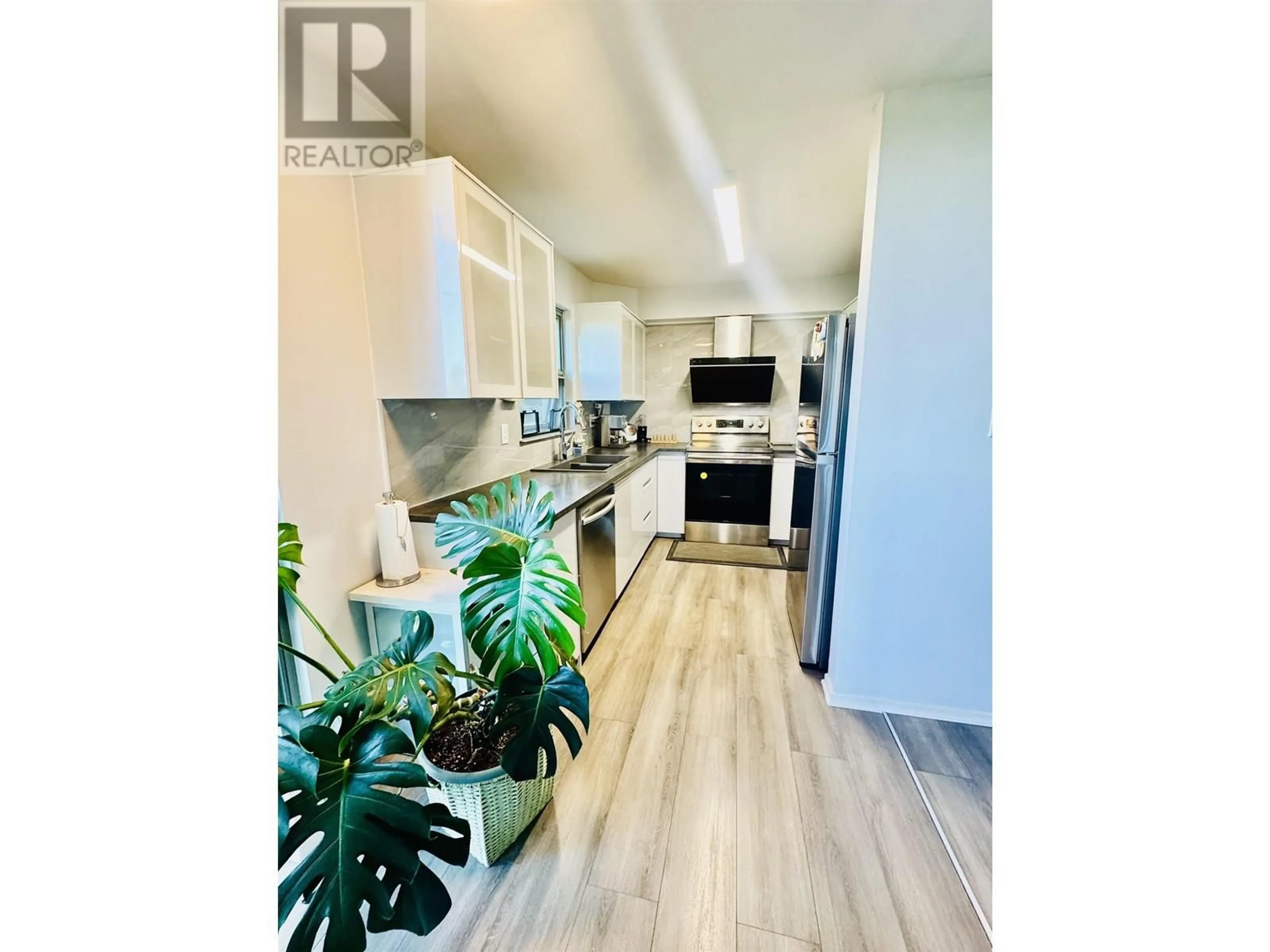 Open concept kitchen, unknown for 310 - 7288 ACORN AVENUE, Burnaby British Columbia V5E4H6