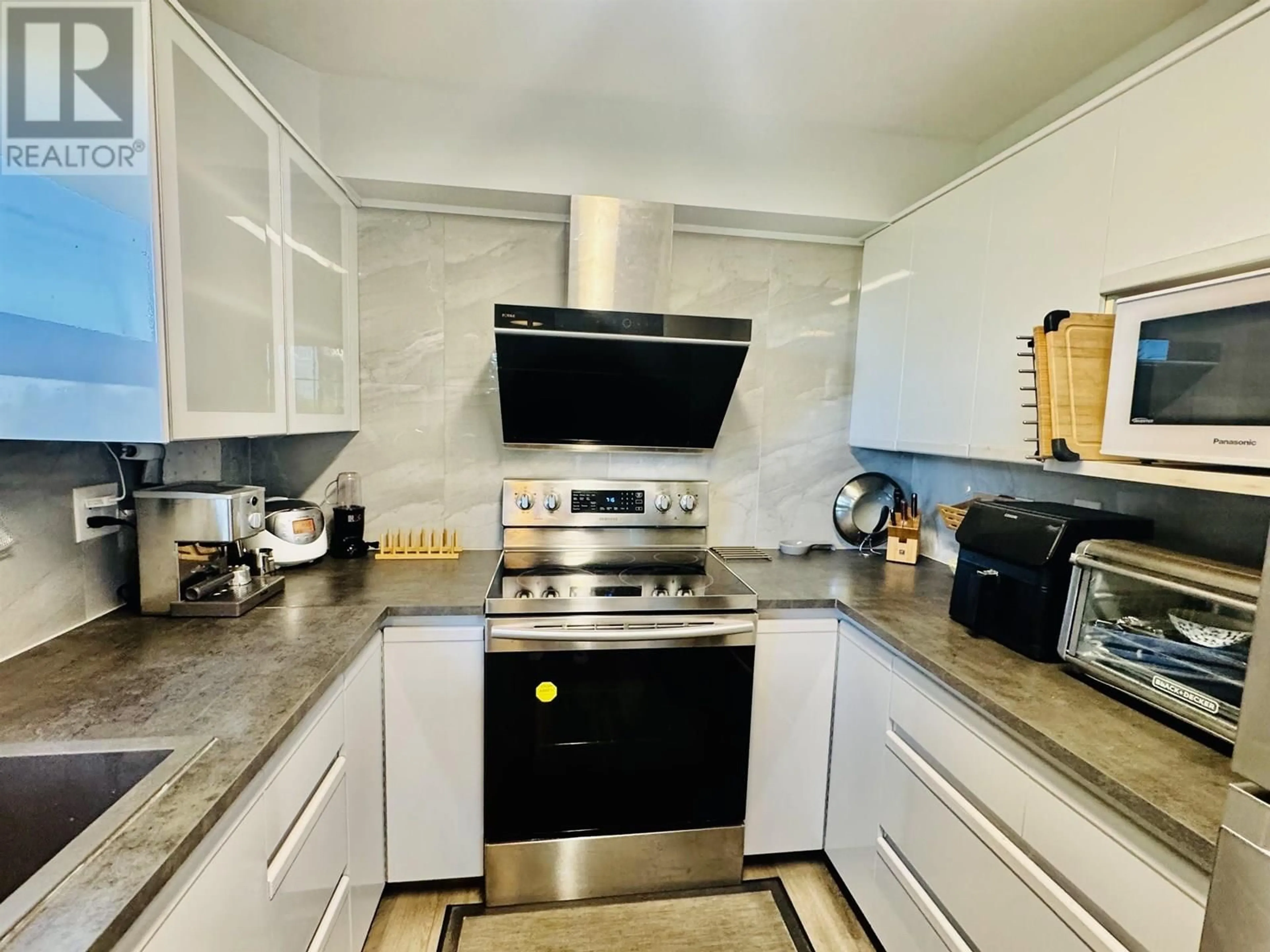 Standard kitchen, ceramic/tile floor for 310 - 7288 ACORN AVENUE, Burnaby British Columbia V5E4H6