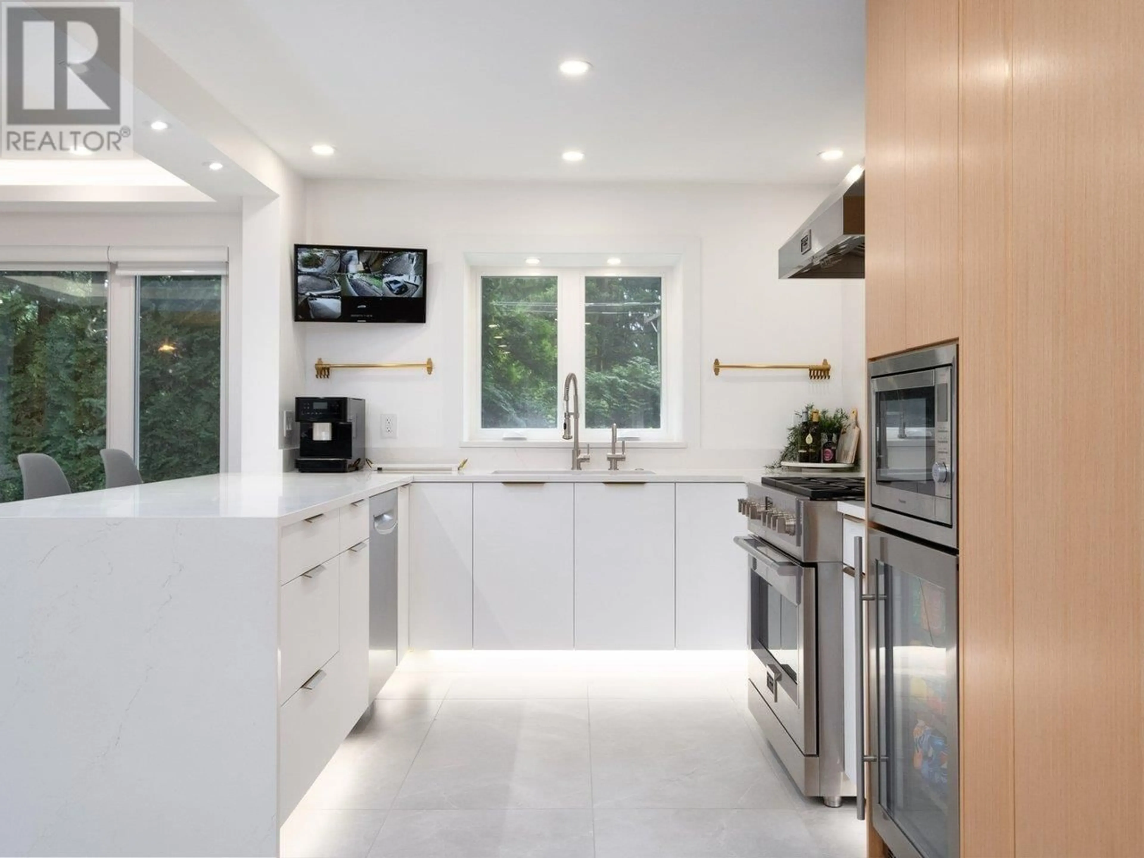 Contemporary kitchen, ceramic/tile floor for 4283 CAPILANO ROAD, North Vancouver British Columbia V7R4J6