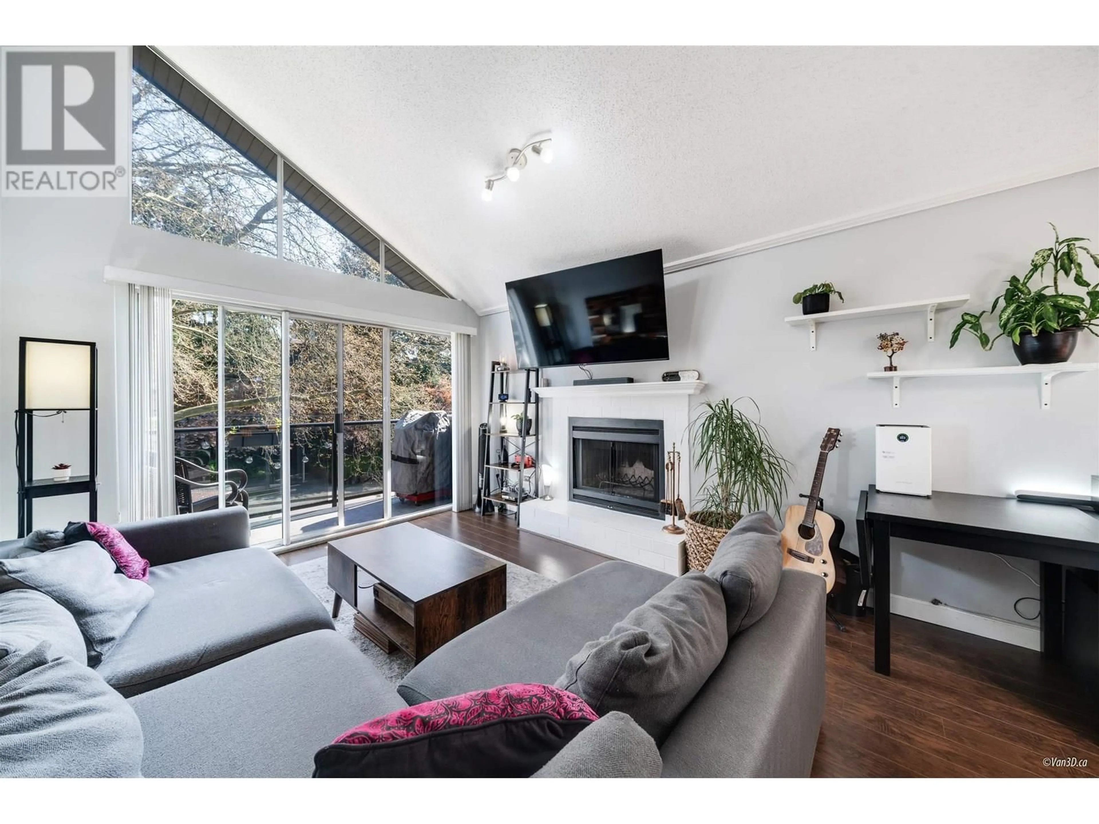 Living room with furniture, wood/laminate floor for 313 - 230 MOWAT STREET, New Westminster British Columbia V3M4B2