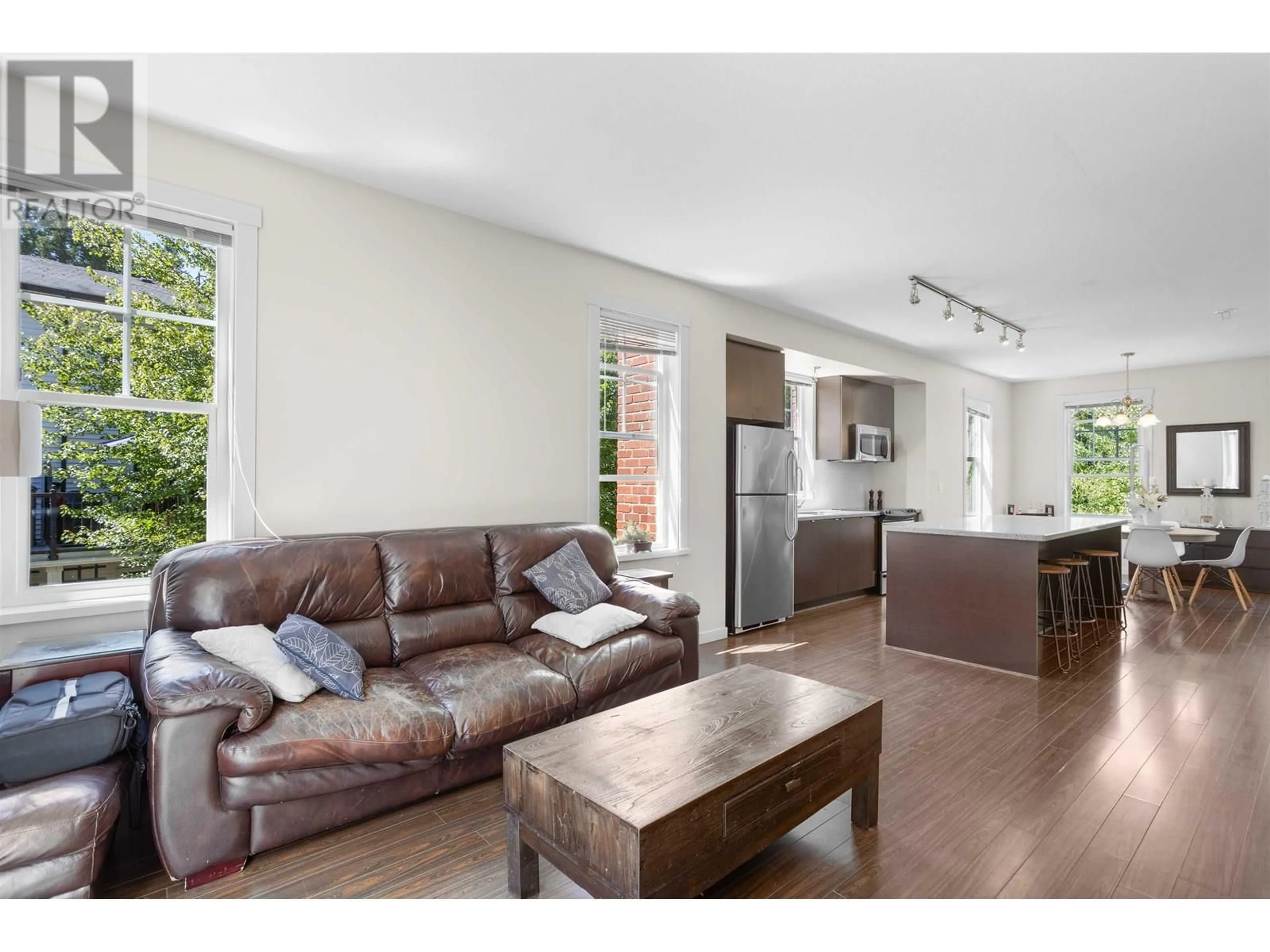 Living room with furniture, wood/laminate floor for 32 - 102 FRASER STREET, Port Moody British Columbia V3H0C7