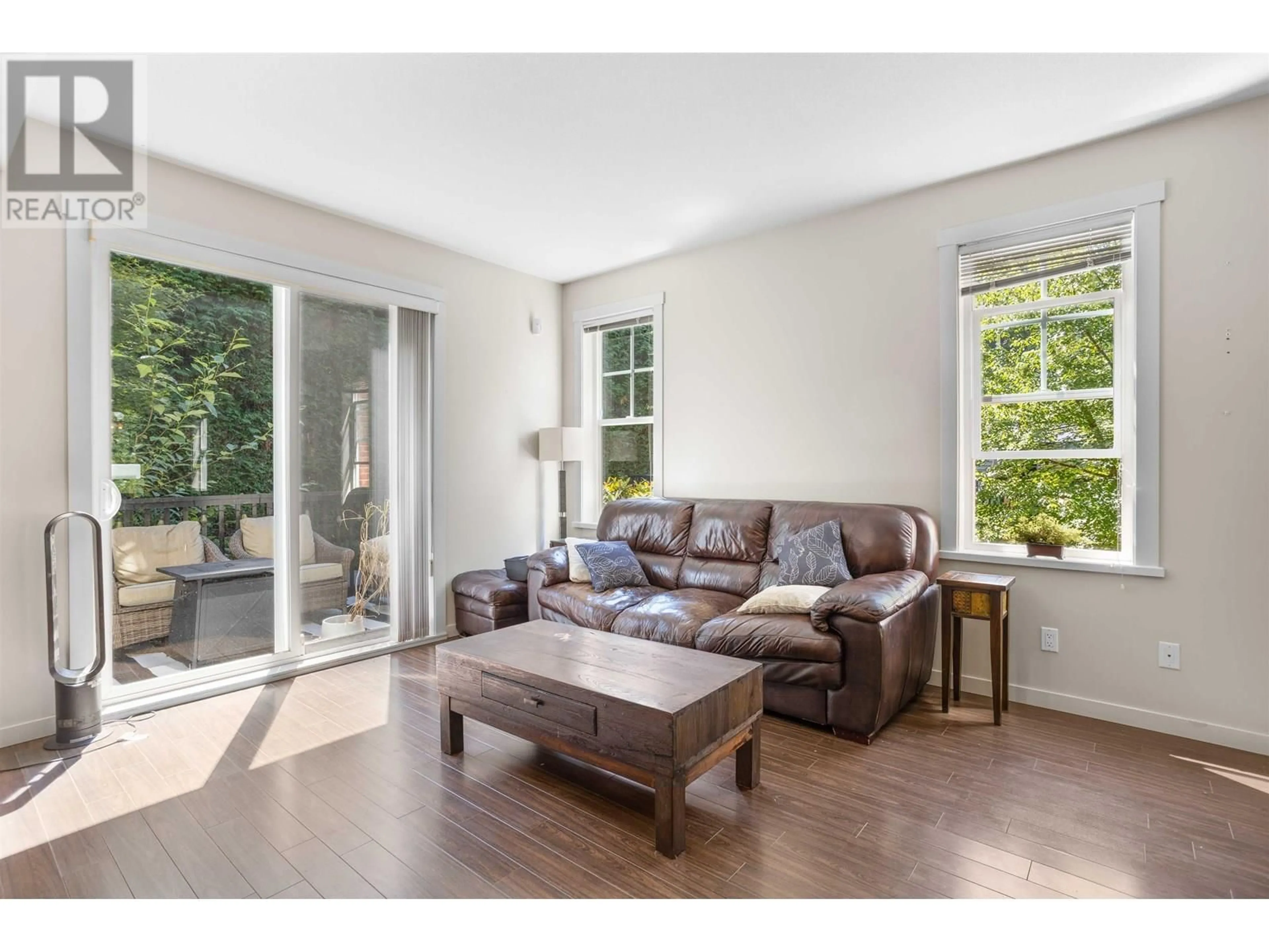 Living room with furniture, wood/laminate floor for 32 - 102 FRASER STREET, Port Moody British Columbia V3H0C7