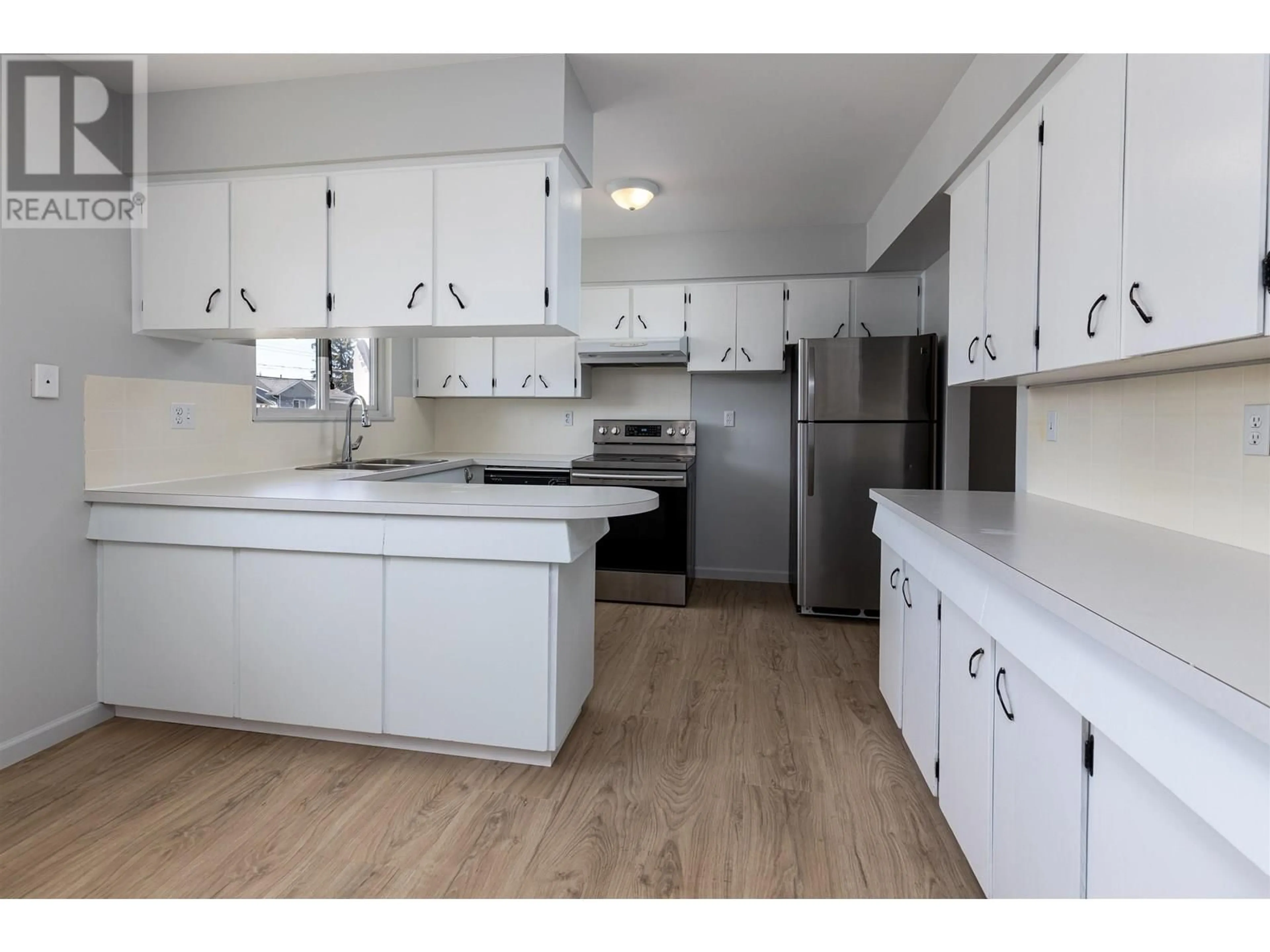 Standard kitchen, wood/laminate floor for 4610 STRAUME AVENUE, Terrace British Columbia V8G2C3