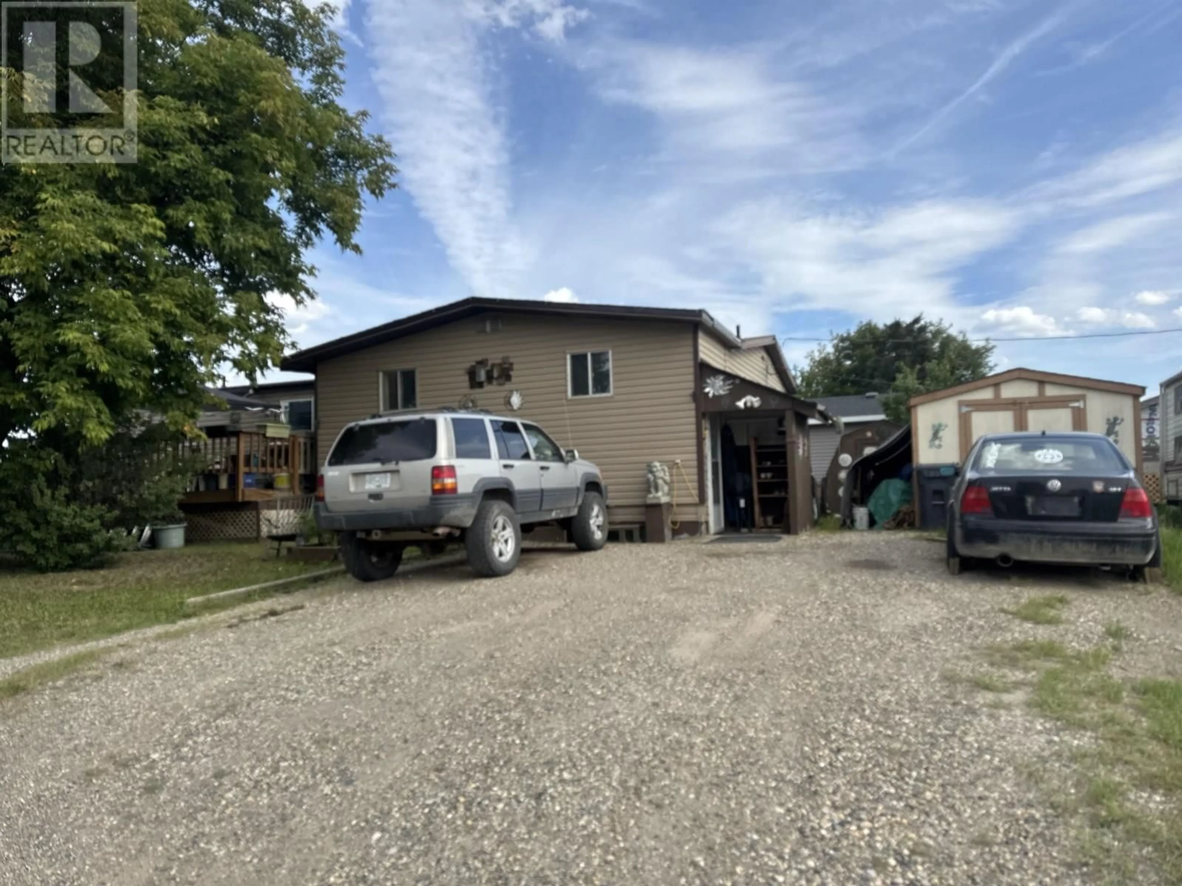 A pic from outside/outdoor area/front of a property/back of a property/a pic from drone, street for 10608 101 STREET, Taylor British Columbia V0C2K0