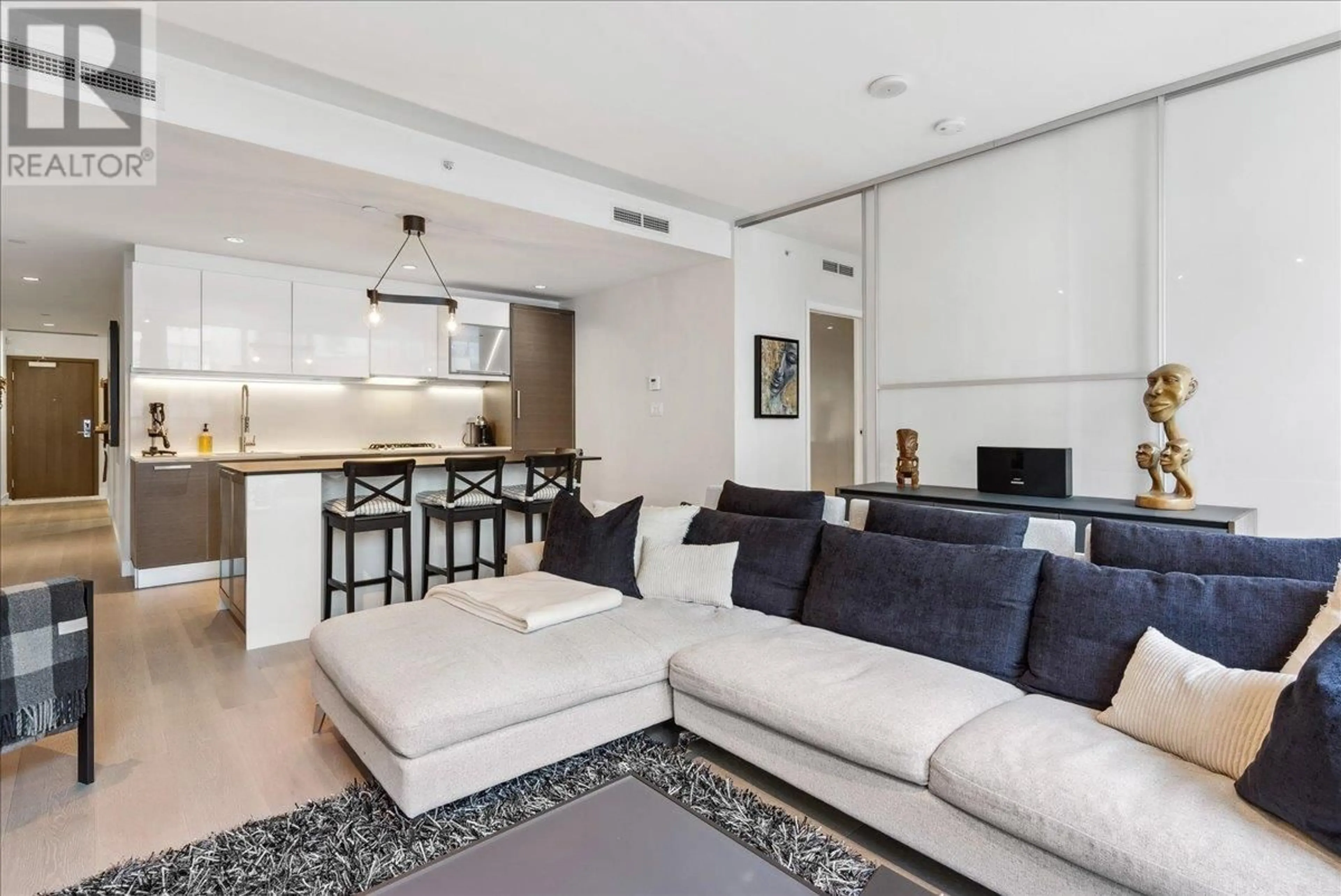 Living room with furniture, unknown for 402 - 1477 PENDER STREET, Vancouver British Columbia V6G2S3