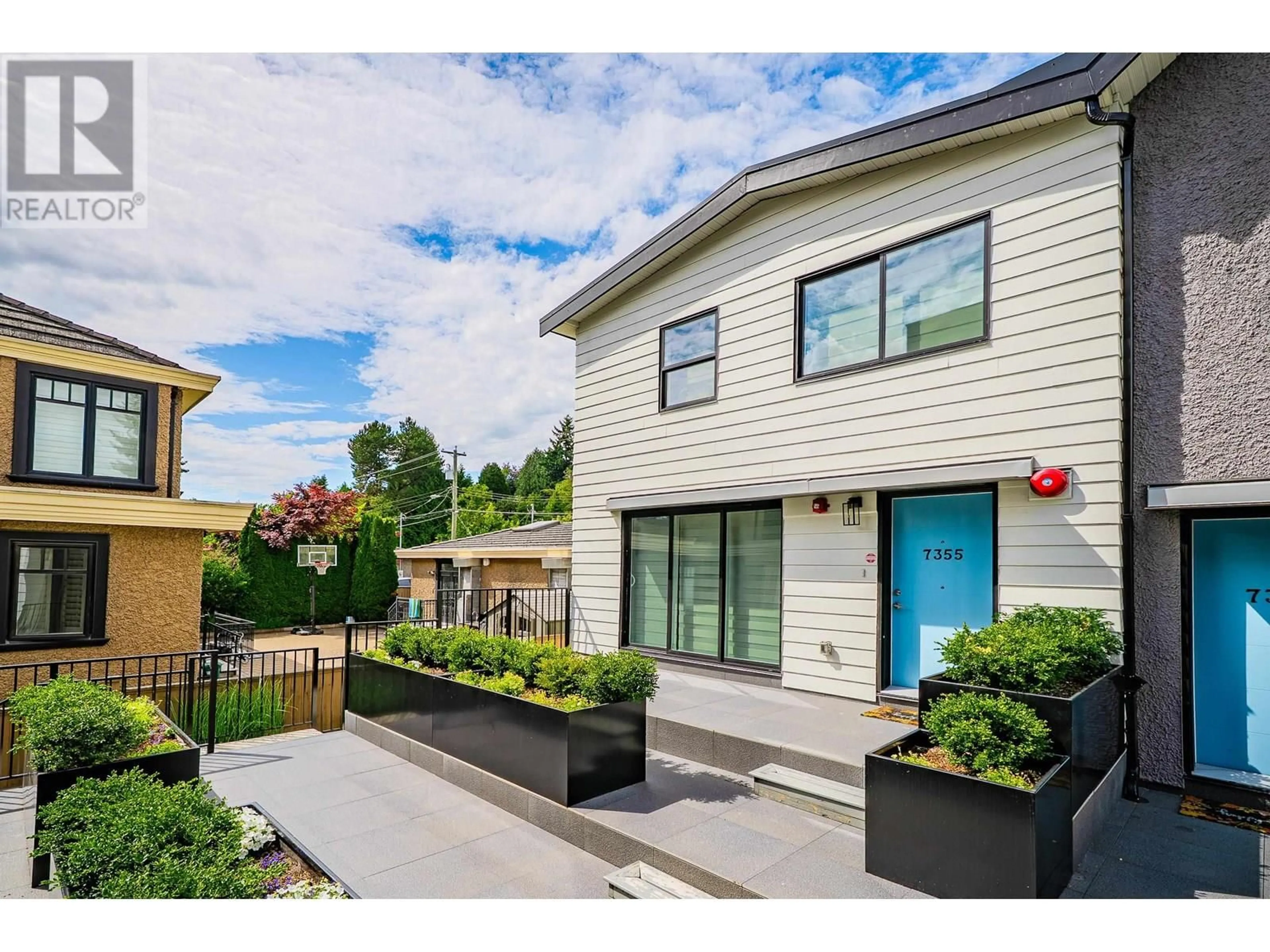 Home with vinyl exterior material, street for 7355 OAK STREET, Vancouver British Columbia V6P0B3