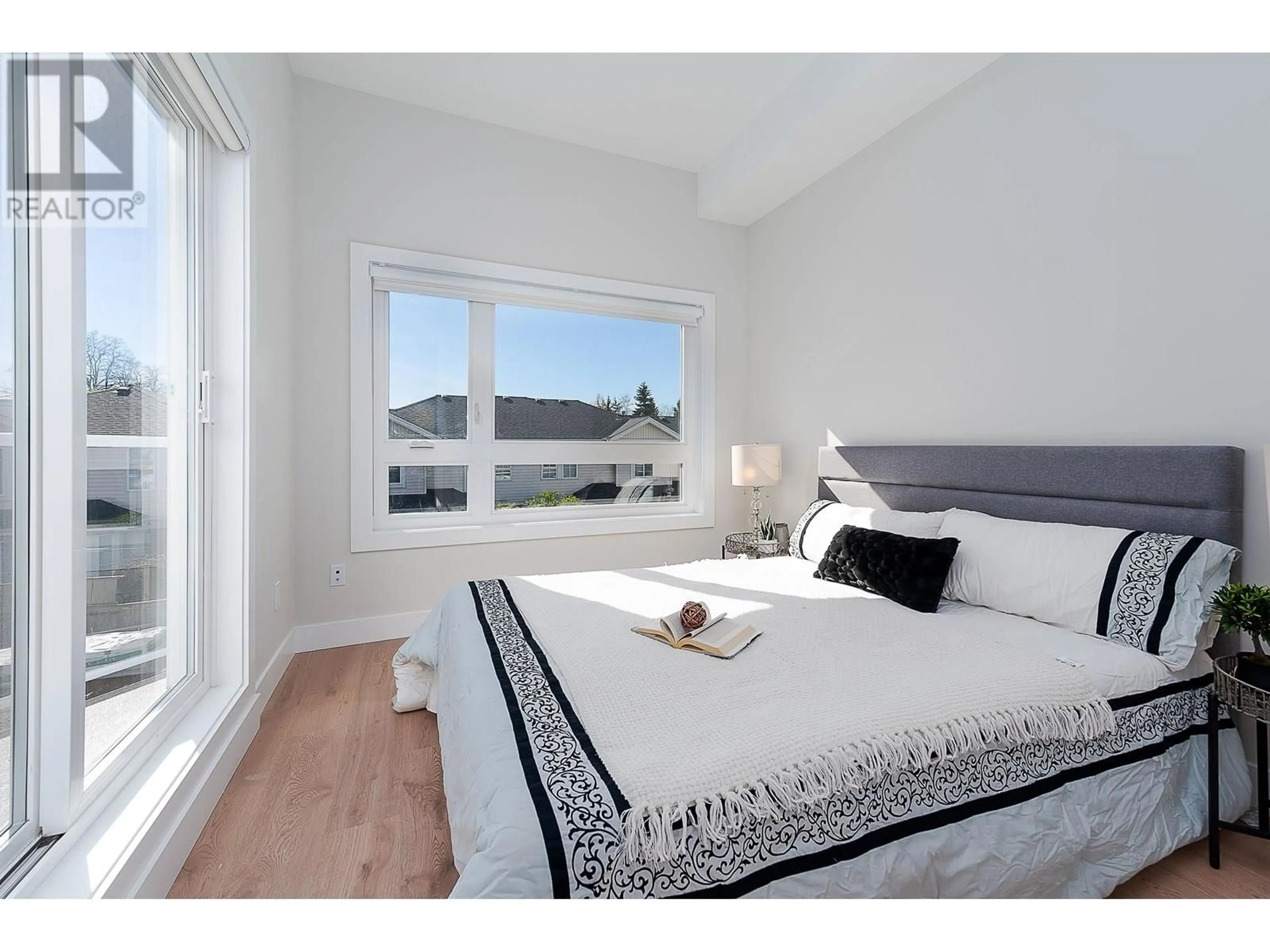 Bedroom with bed, wood/laminate floor for 3 - 3033 SHELL ROAD, Richmond British Columbia V6X0B8