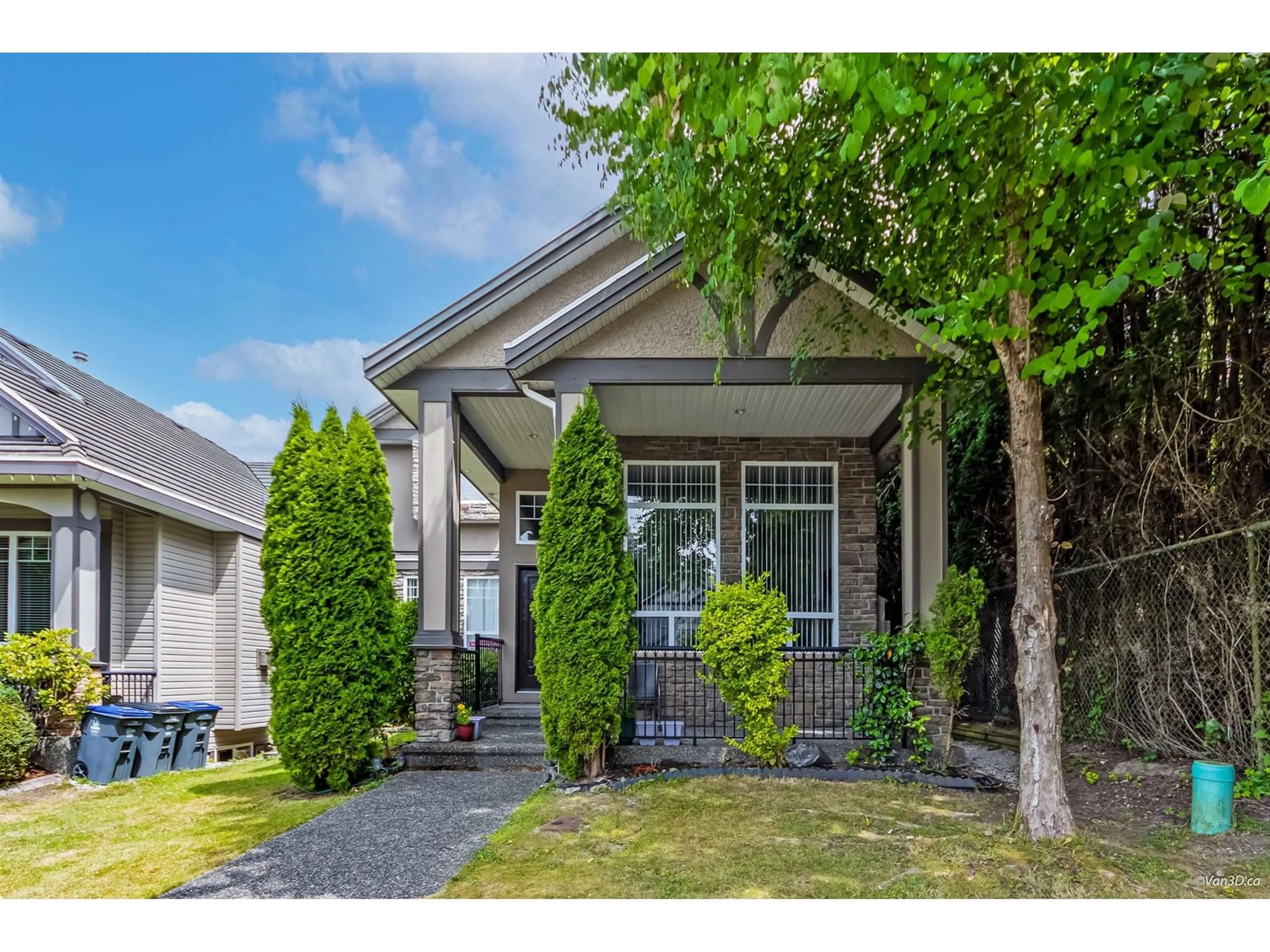 Home with vinyl exterior material, street for 7506 143C, Surrey British Columbia V3W1S2