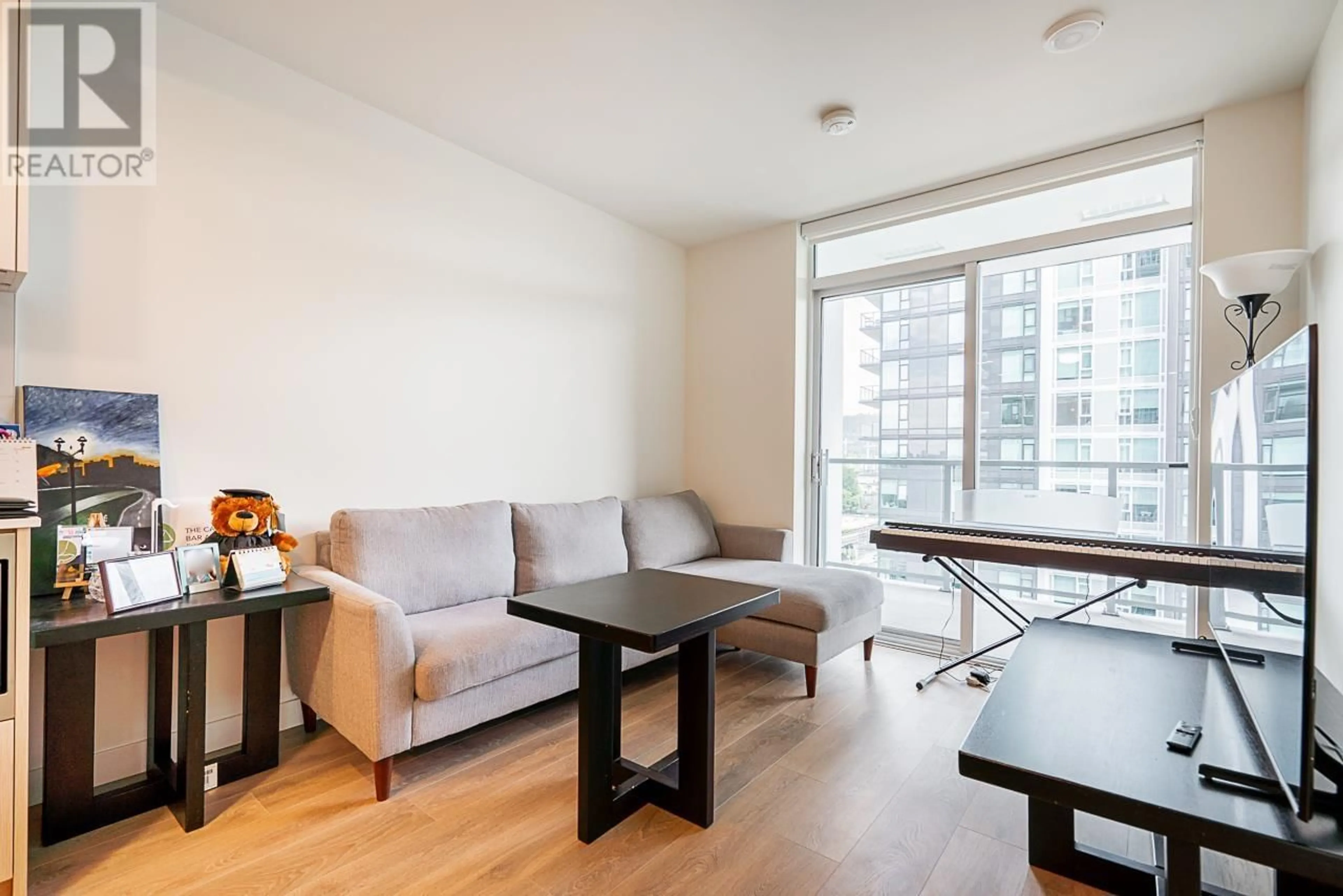 Living room with furniture, wood/laminate floor for 1306 - 308 ALDERSON AVENUE, Coquitlam British Columbia V3K0J2